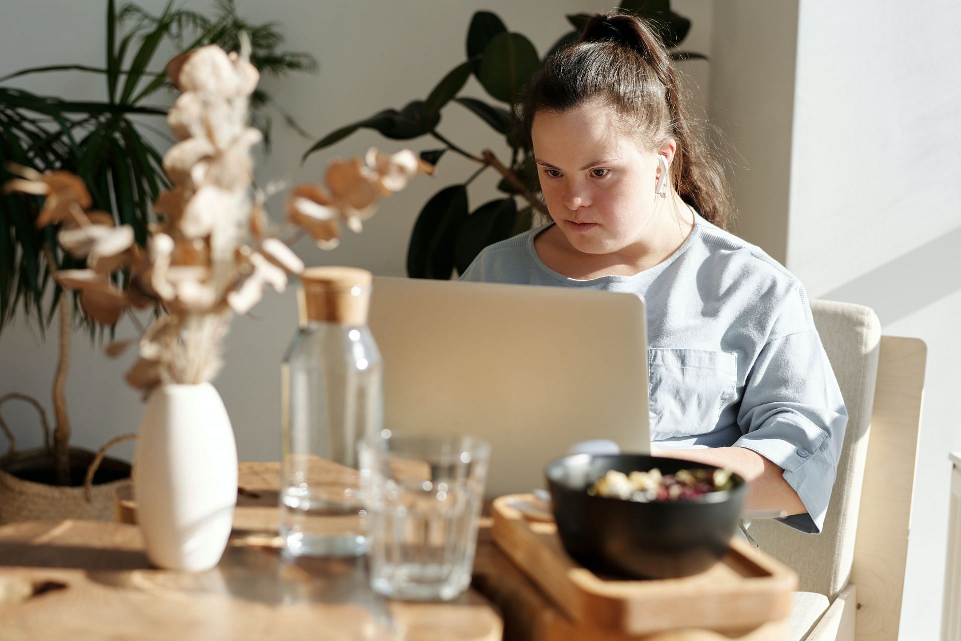 We can help people with Down syndrome by just being normal around them. (Image via Pexels/ Cliff Booth)