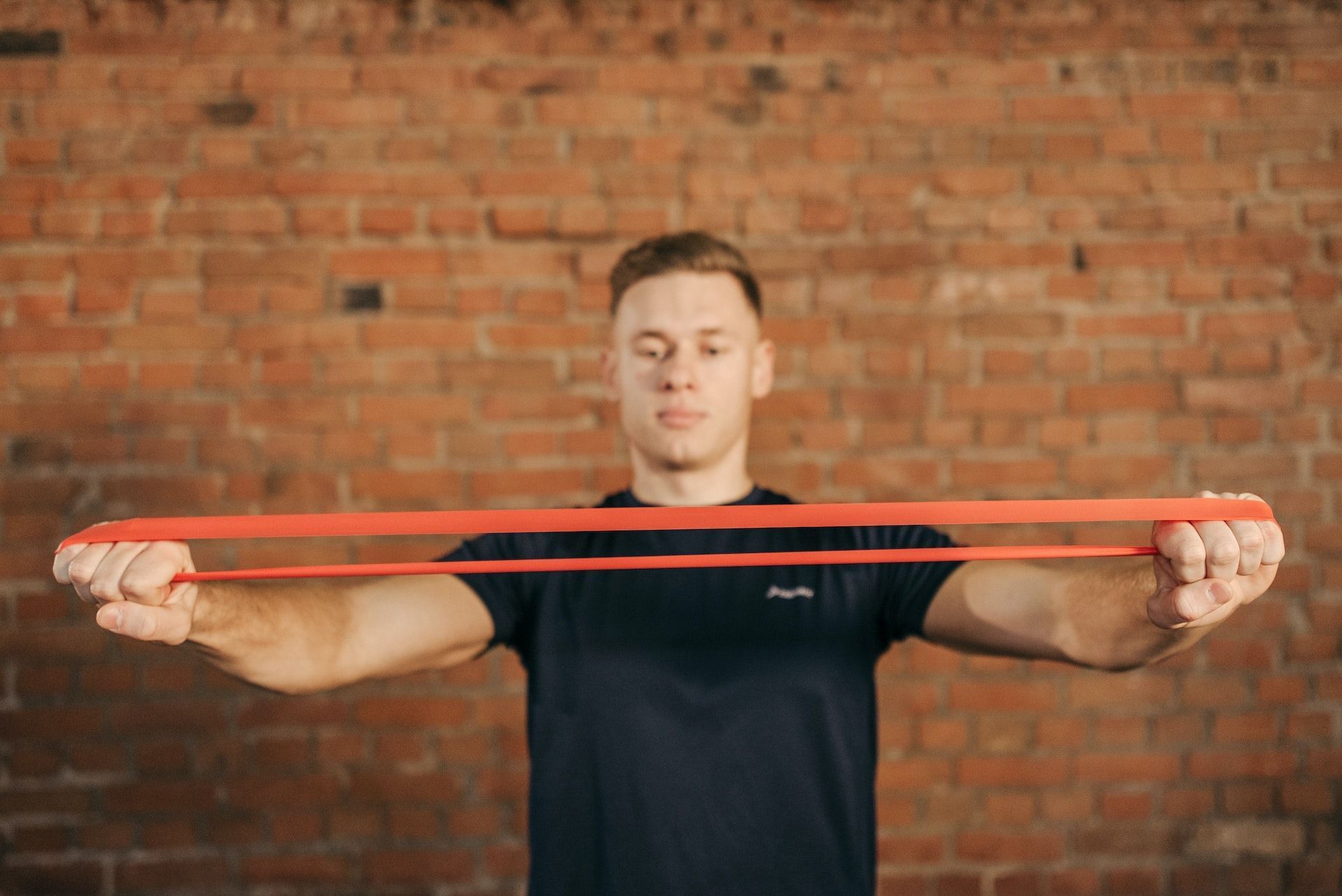 Monster walk is done using a resistance band. (Photo via Pexels/Pavel Danilyuk)