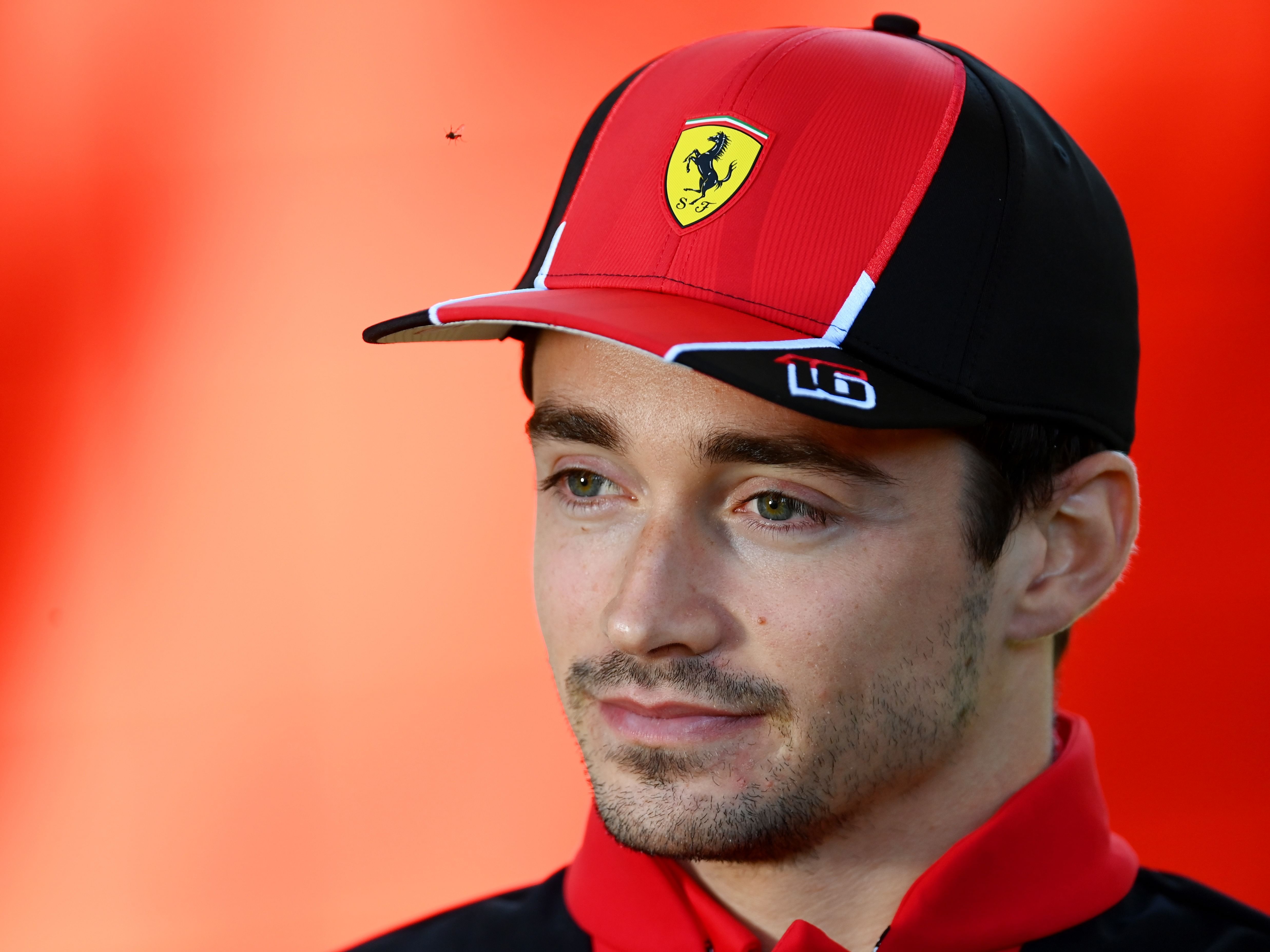 Charles Leclerc talks to the media in the paddock during previews ahead of the 2023 F1 Australian Grand Prix. (Photo by Quinn Rooney/Getty Images)