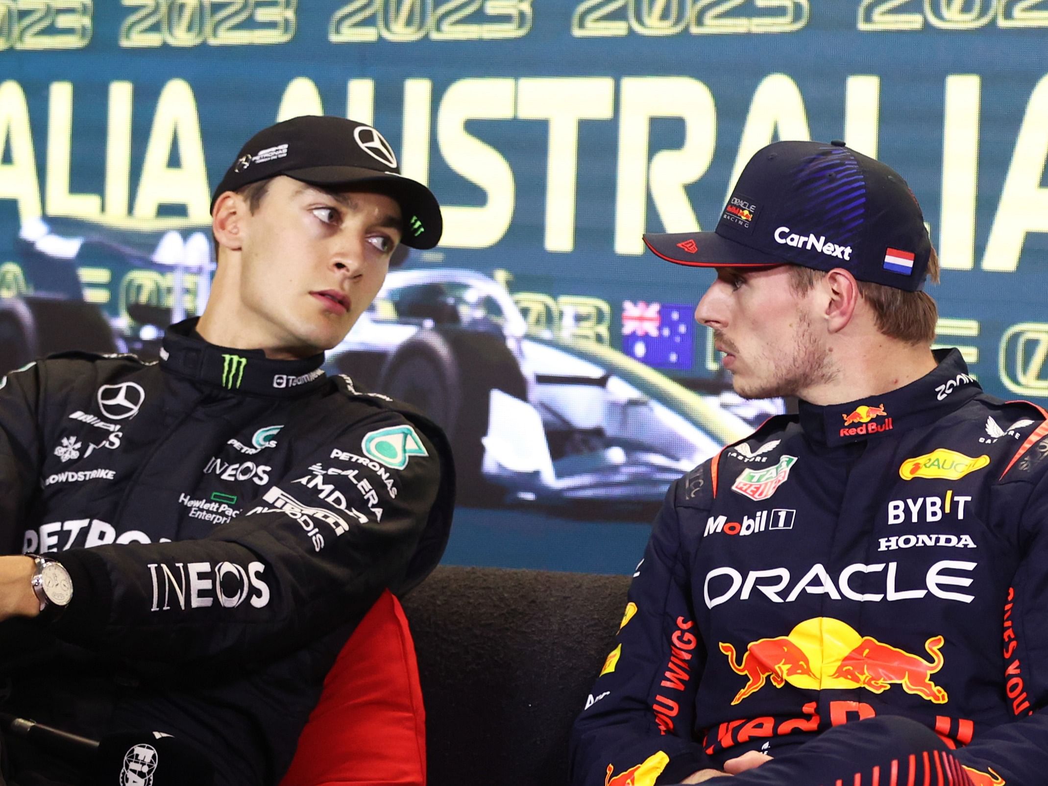Max Verstappen (R) and George Russell (L) attend the press conference after qualifying ahead of the 2023 F1 Australian Grand Prix. (Photo by Robert Cianflone/Getty Images)