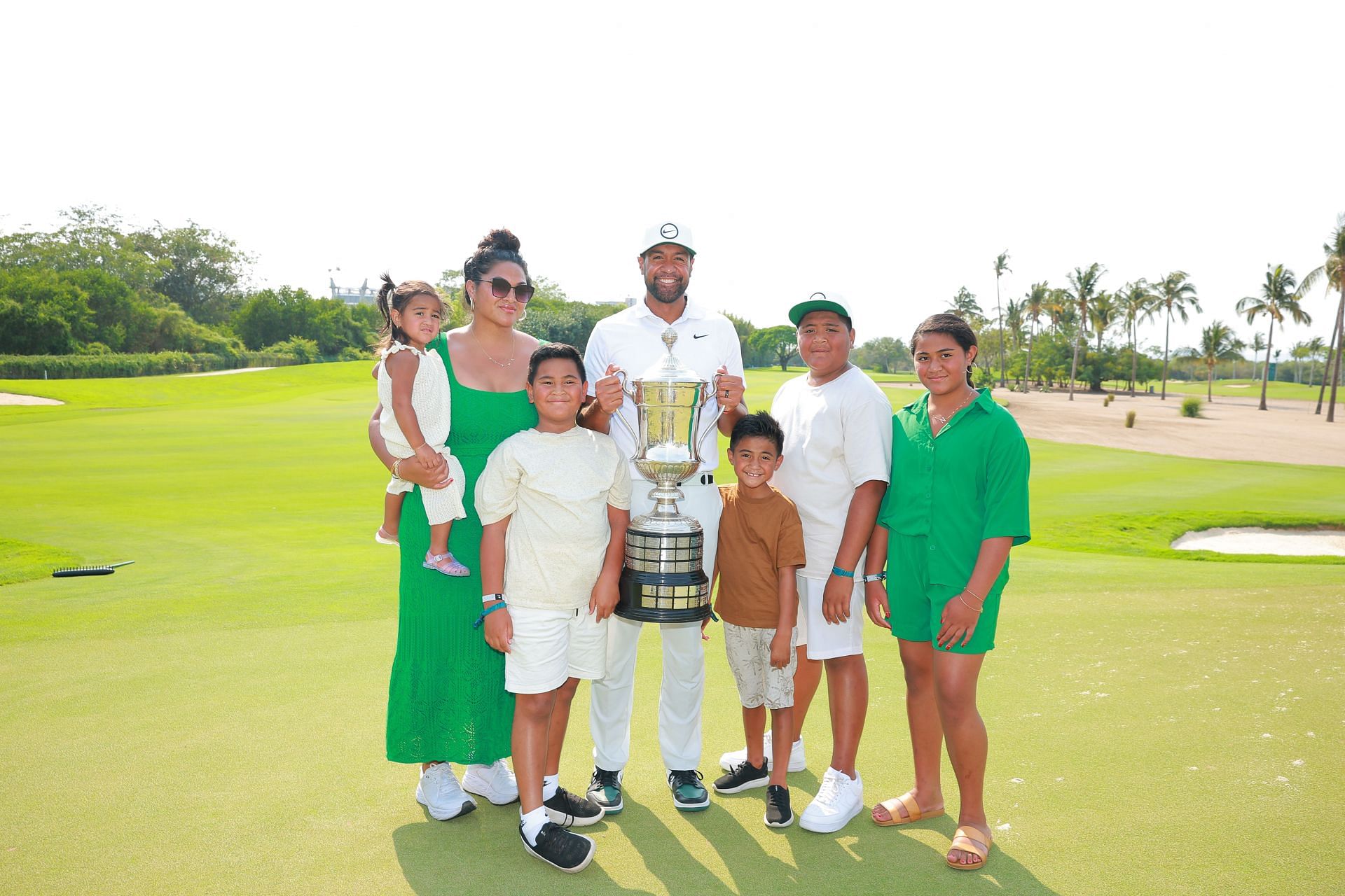 Tony Finau poses with his family after winning the Mexico Open at Vidanta
