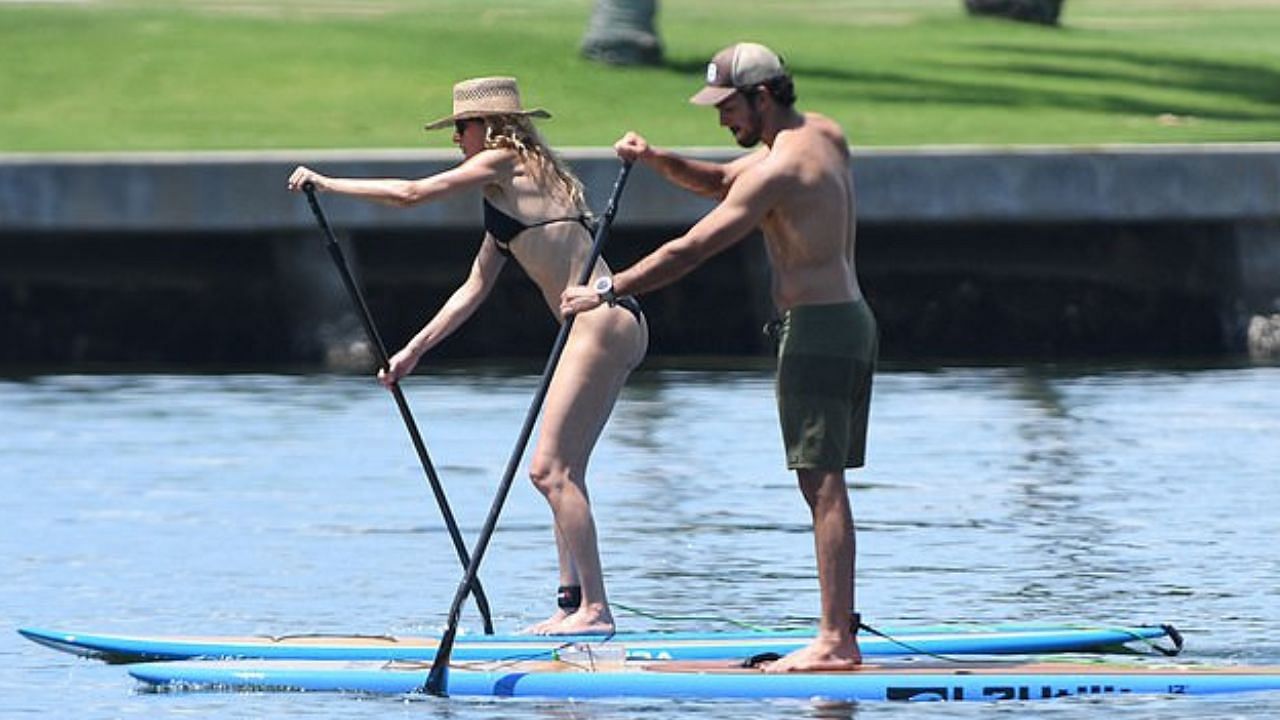 Another shot of the pair wakeboarding. Credit: Daily Mail