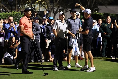 Tiger Woods, Rory McIlroy, Jordan Spieth, and Justin Thomas prepare to play from the first tee during the seventh edition of The Match