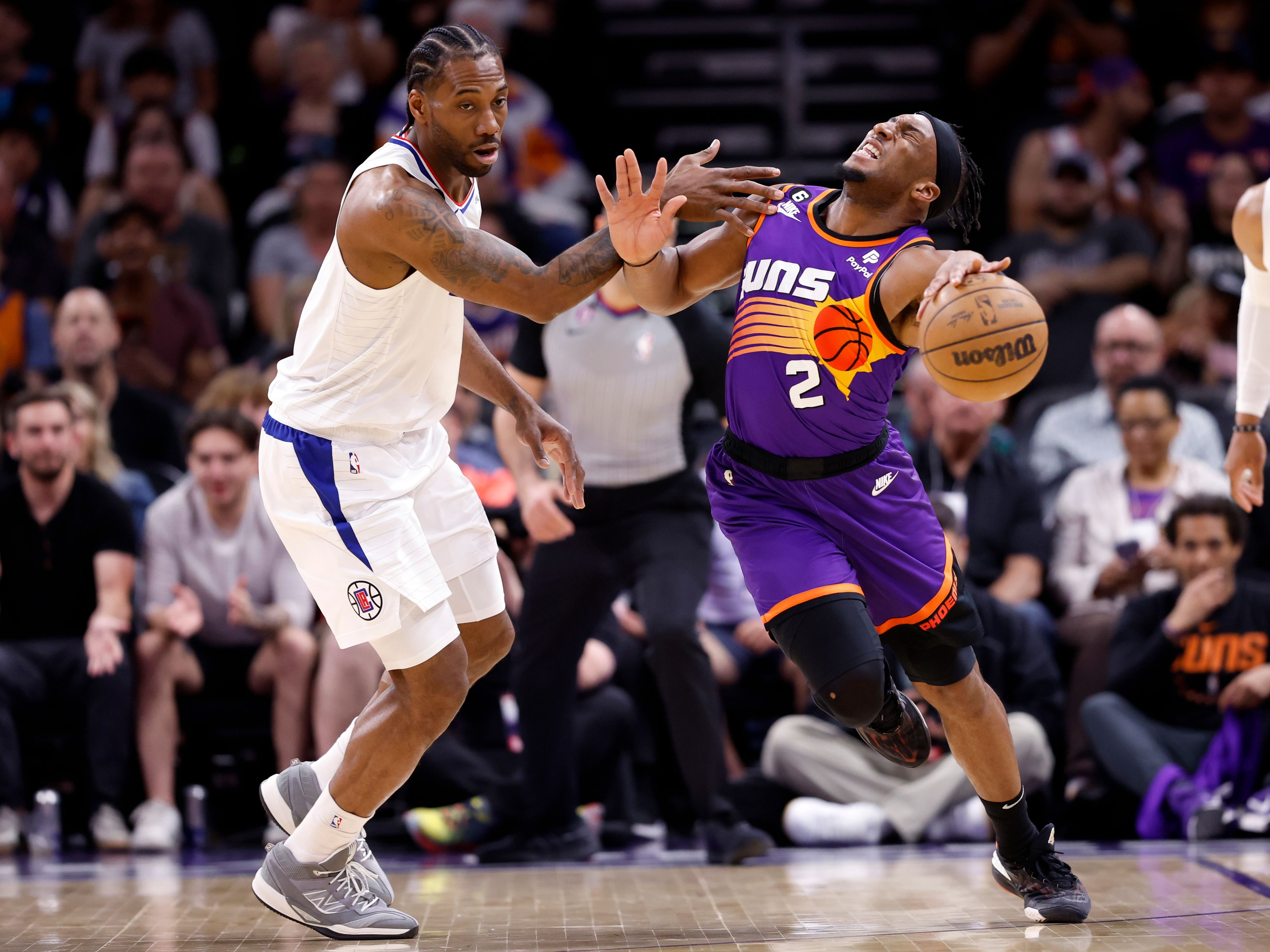 Kawhi Leonard commits take foul Josh Okogie during 2023 NBA playoffs 