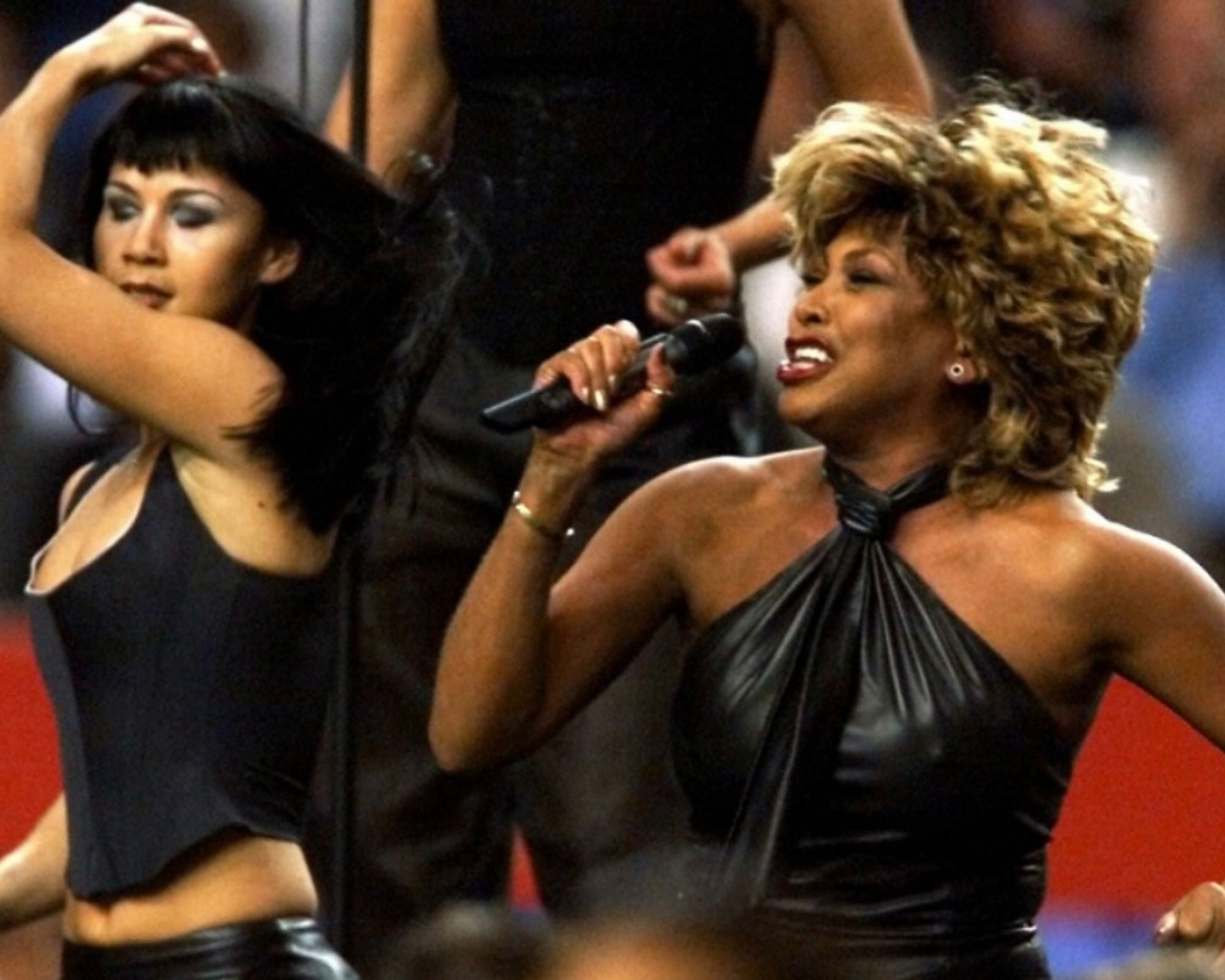 Legendary singer Tina Turner performing during Super Bowl XXXIV