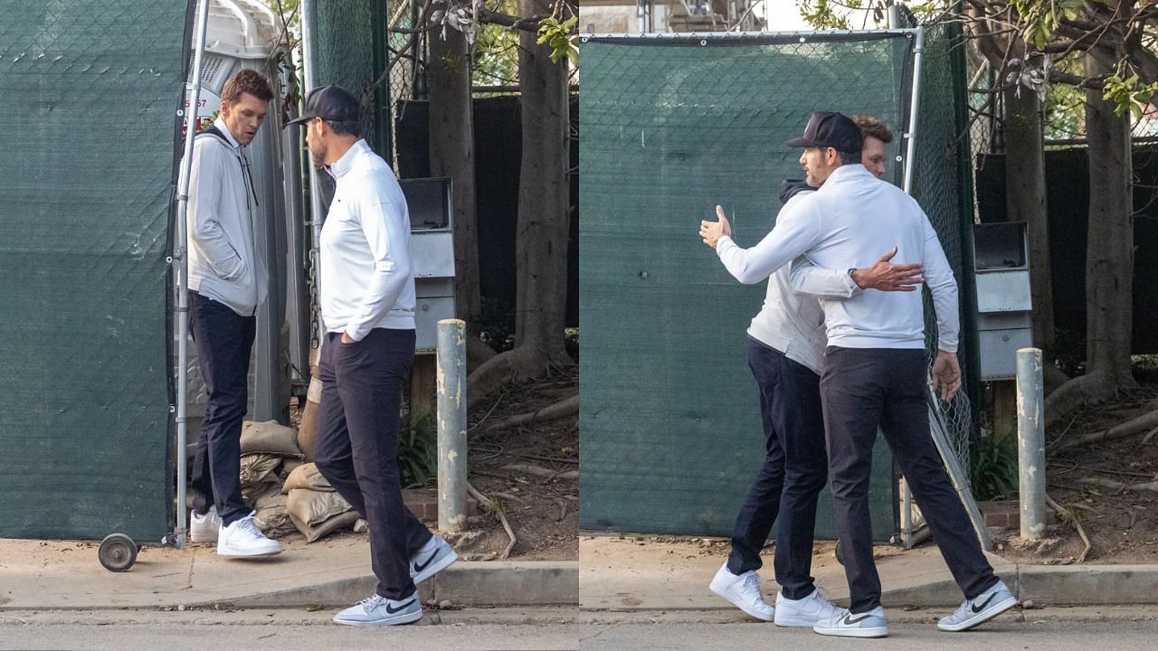 Tom Brady speaks with a man outside an estate he has been surveying (via Splash News)