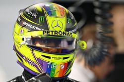 Why is Lewis Hamilton wearing the rainbow-themed helmet during the 2023 F1 Miami GP in support of the LGBTQ+ community?