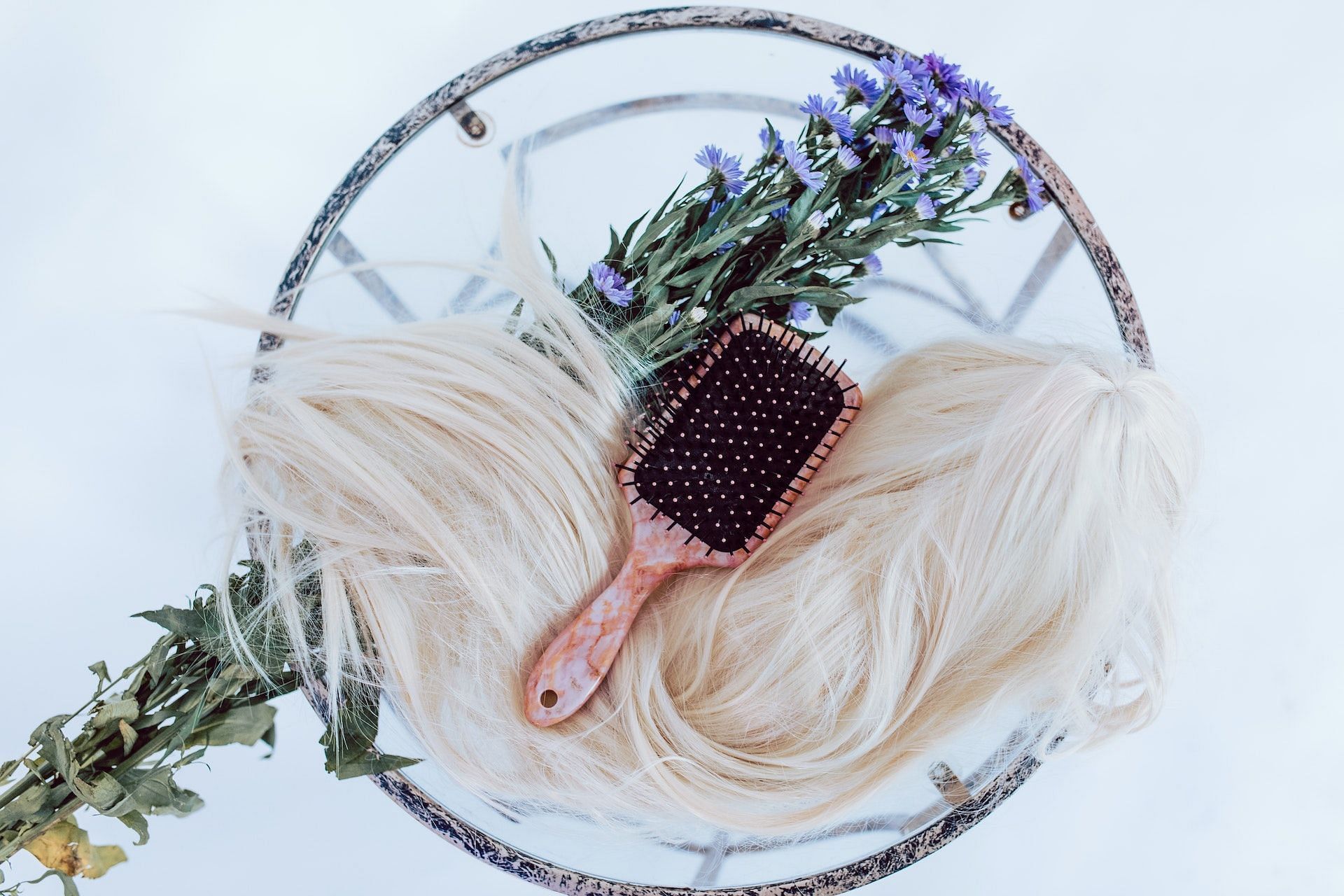 There are several tips for hair regrowth for women. (Photo via Pexels/RDNE Stock project)