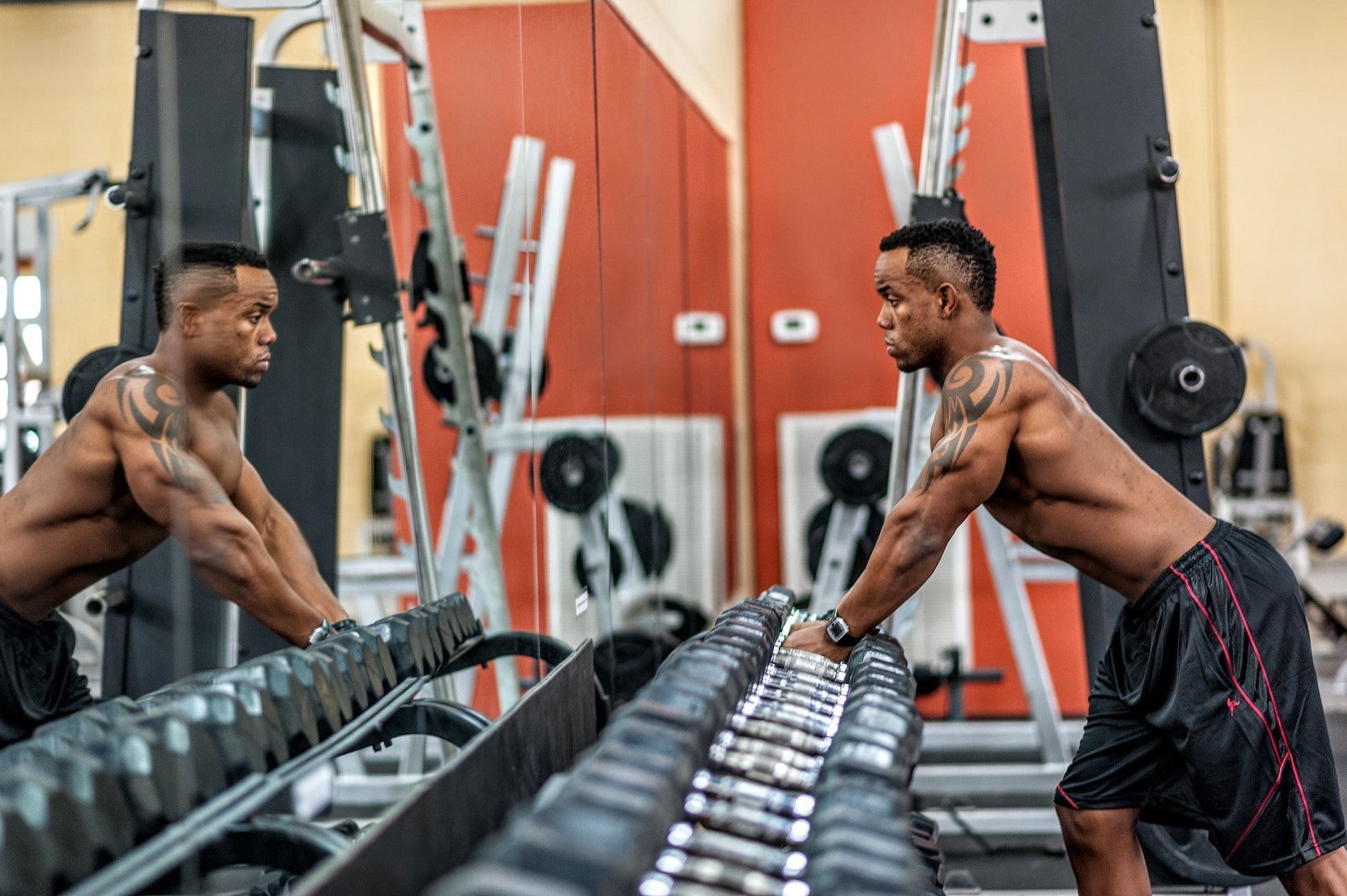 Dumbbell bench press is among the top gym full chest workouts. (Photo via Pexels/Joseph Wayne Buchanan)