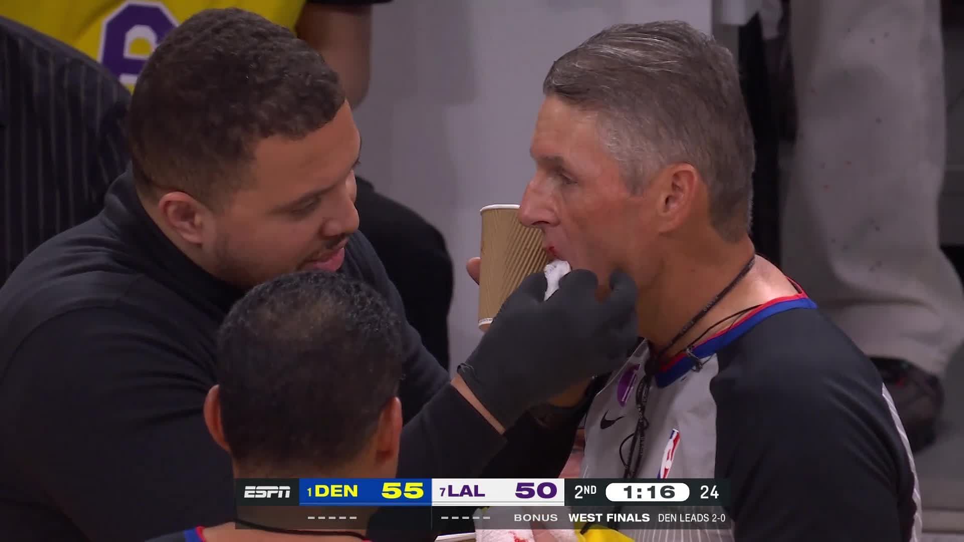 Scott Foster bloodies lip after collision with LeBron James