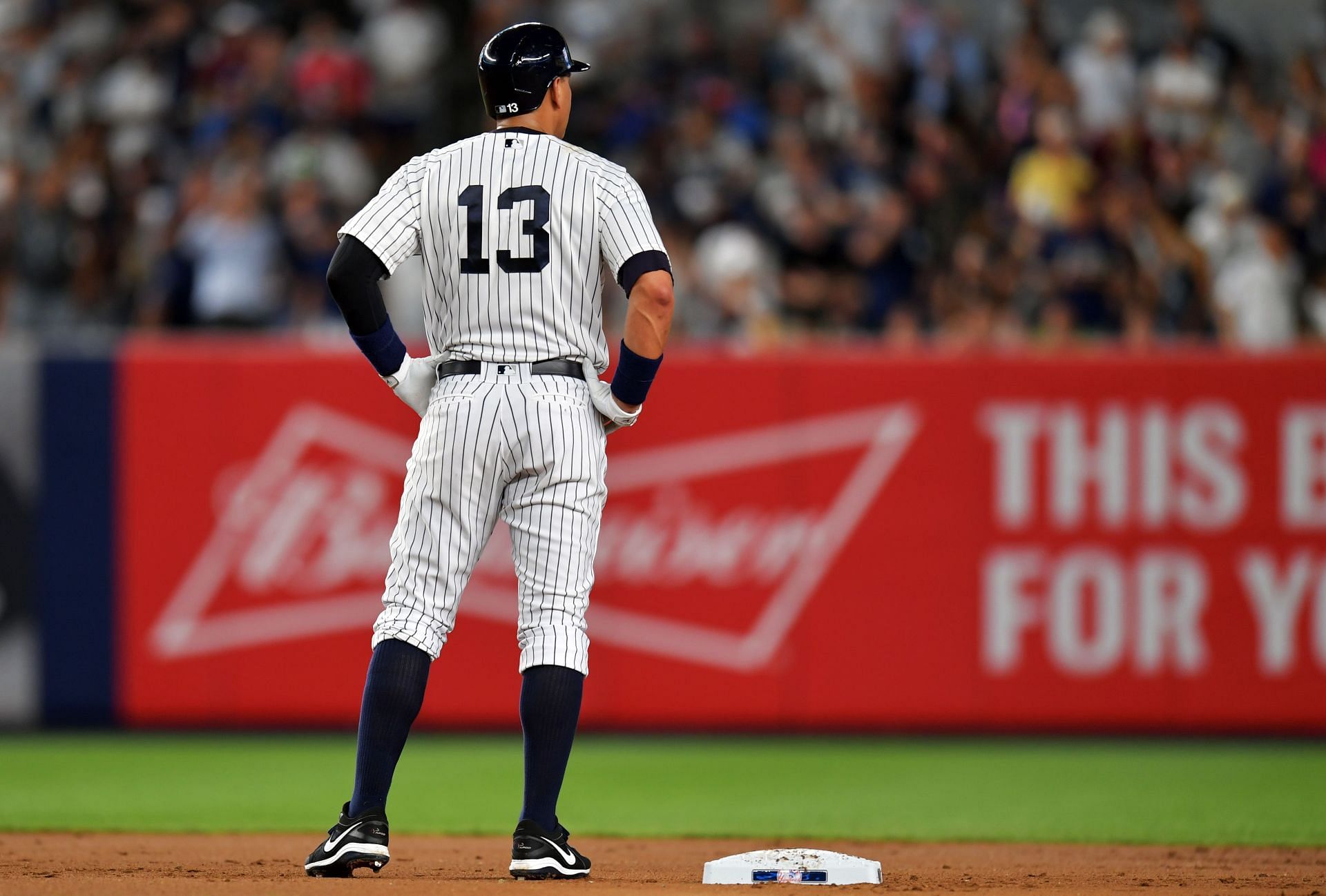 Alex Rodriguez #13 of the New York Yankees stands at second base