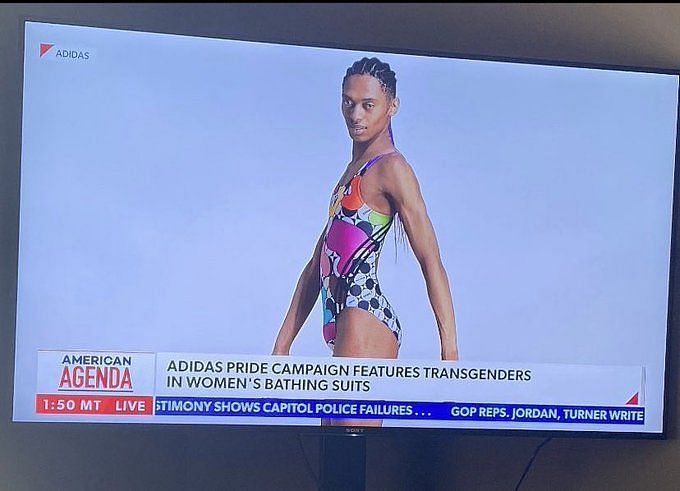 Adidas Pride 2023 women's swimsuit modeled by a man