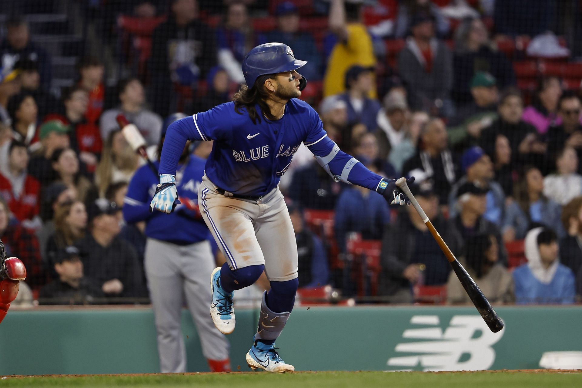 Bo Bichette #11 of the Toronto Blue Jays drops his bat as he watches his three run home run against the Boston Red Sox during the second inning at Fenway Park