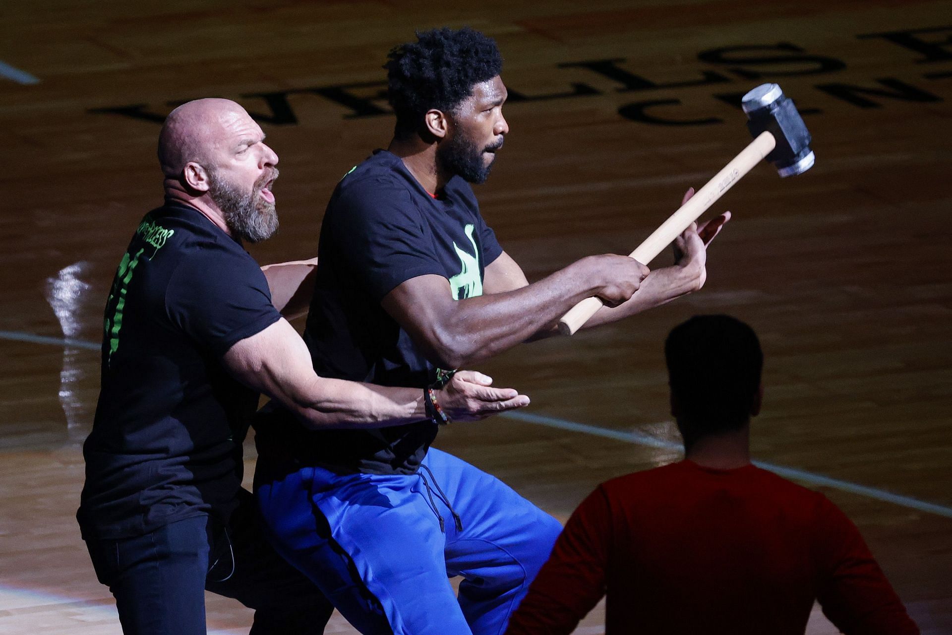 WWE legend Triple H and Joel Embiid of the Philadelphia 76ers