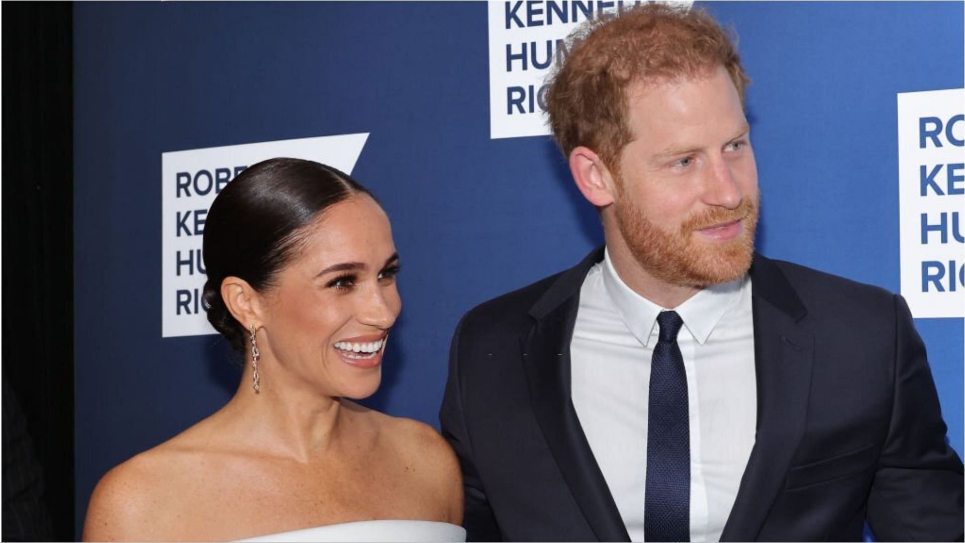 Prince Harry and Meghan Markle were chased by the paparazzi as they stepped out of an event (Image via Mike Coppola/Getty Images)