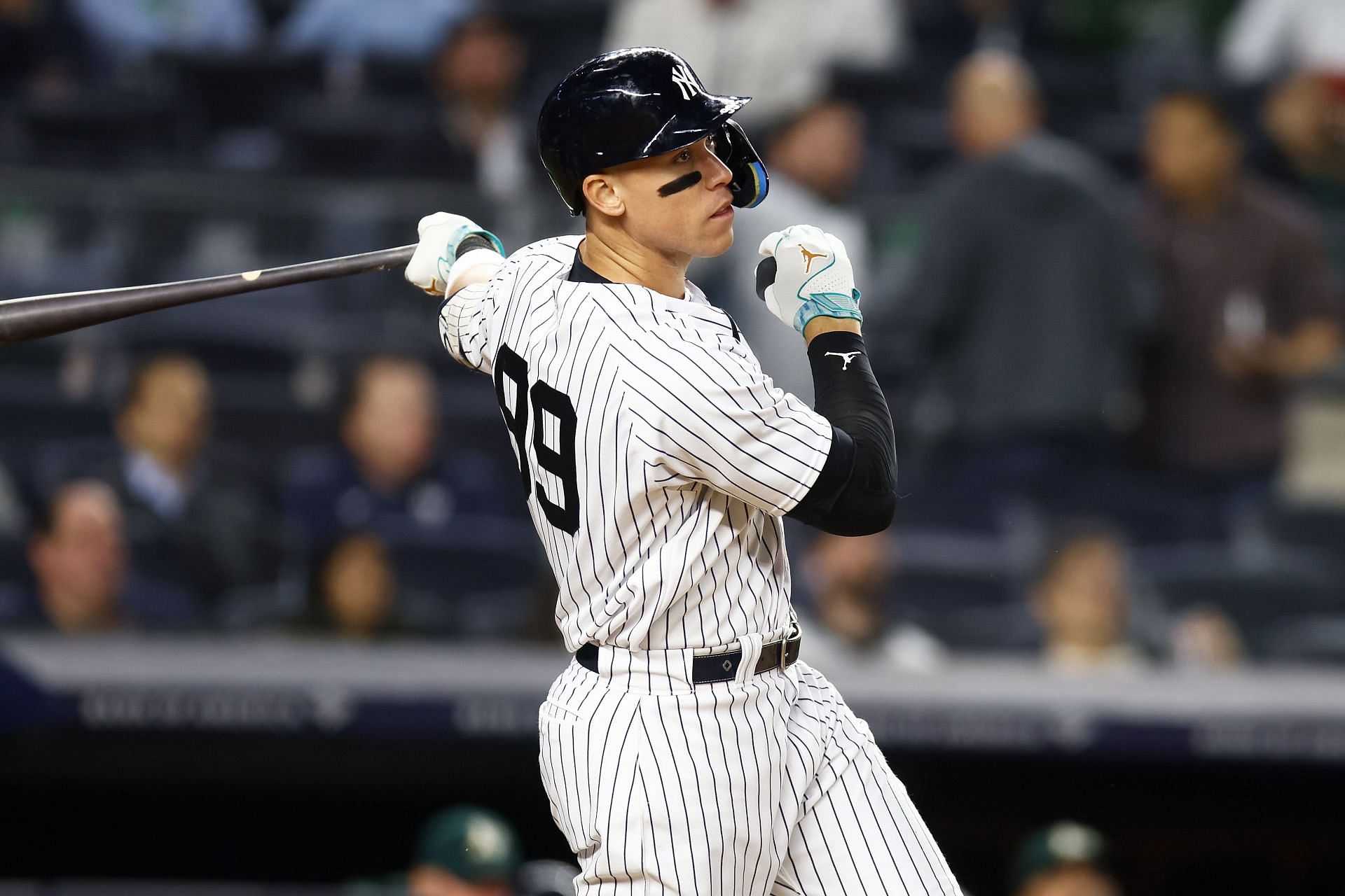 Aaron Judge of the New York Yankees hits an RBI sacrifice fly against the Oakland Athletics at Yankee Stadium