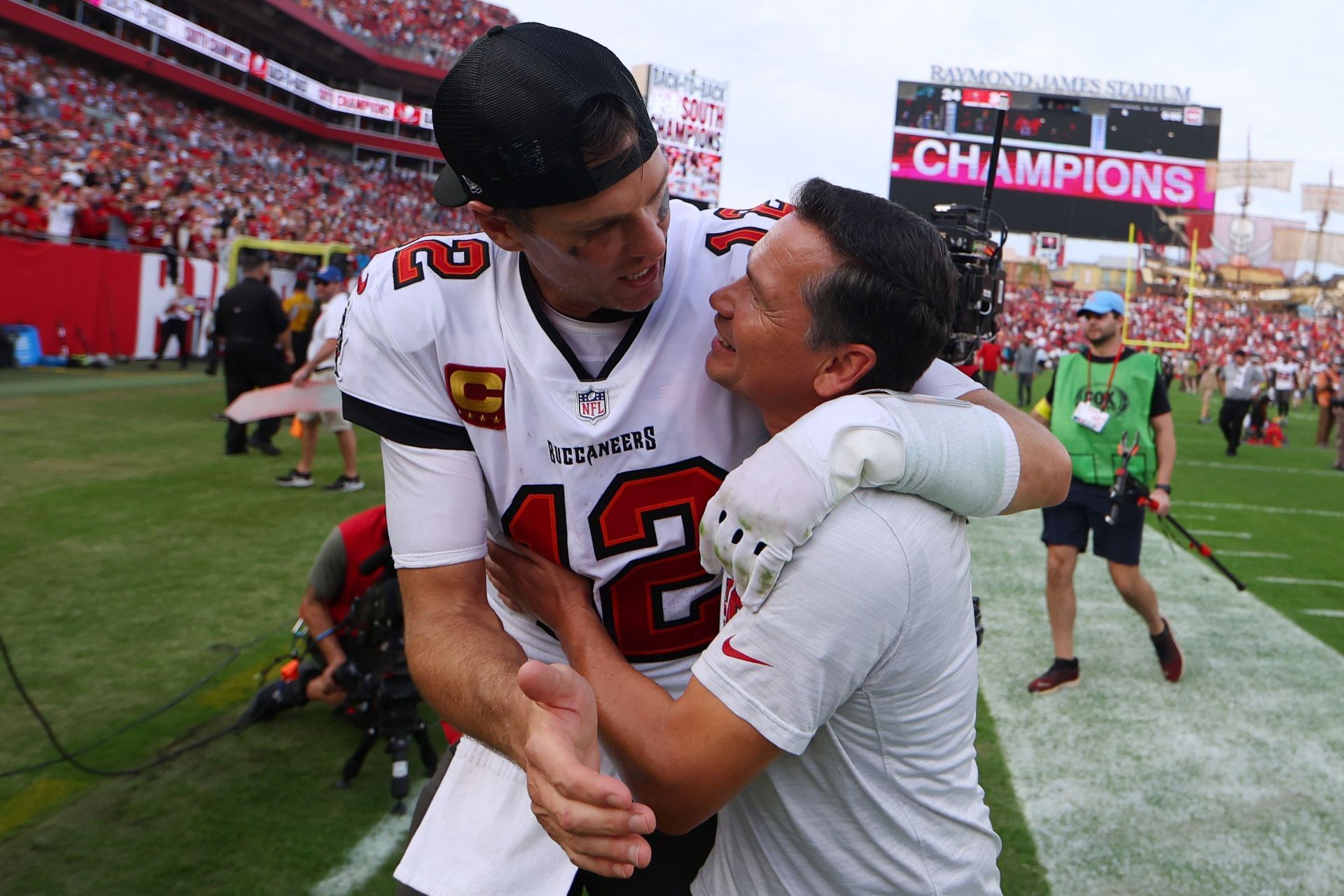 Tom Brady and Alex Guerrero