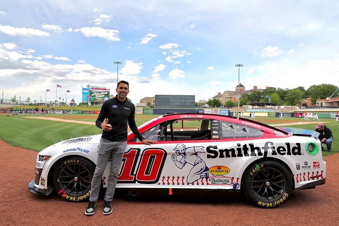 NASCAR Cup Series driver Aric Almirola poses with his new throwback-liveried #10 Ford Mustang slated to run at the throwback weekend at Darlington Raceway in 2023. Picture Credits: Aric Almirola