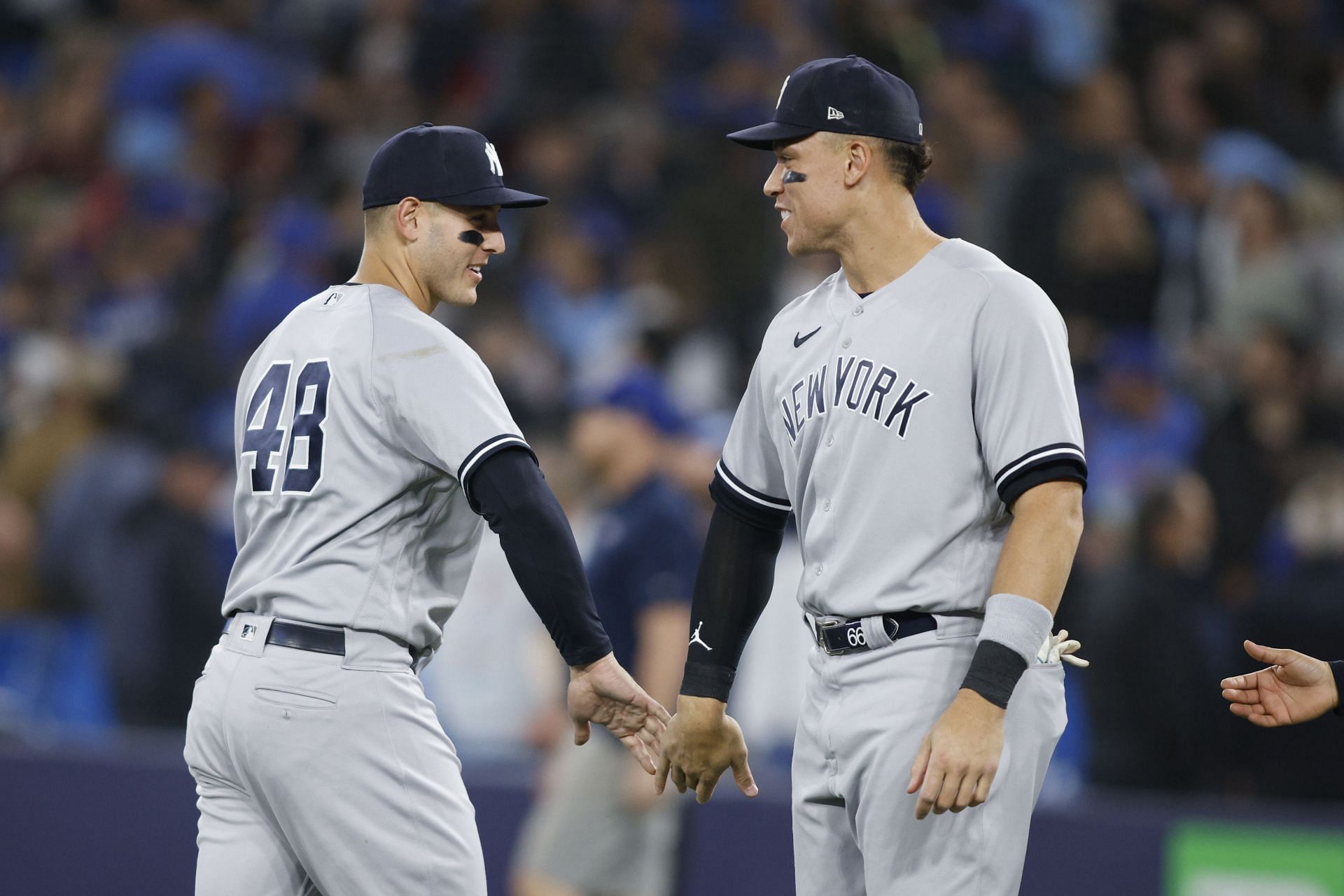 Aaron Judge and Anthony Rizzo celebrate a 4-2 win over the Toronto Blue Jays at Rogers Centre