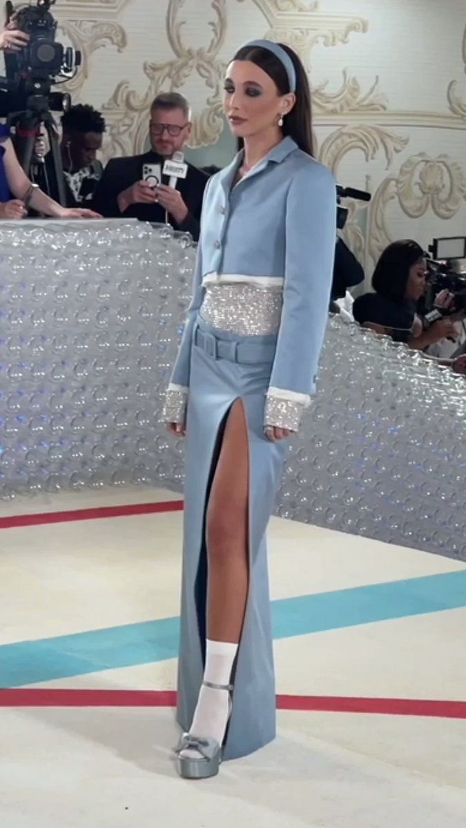 Emma Chamberlain in cropped blazer and high-slit skirt @ Met Gala  after-party 2023