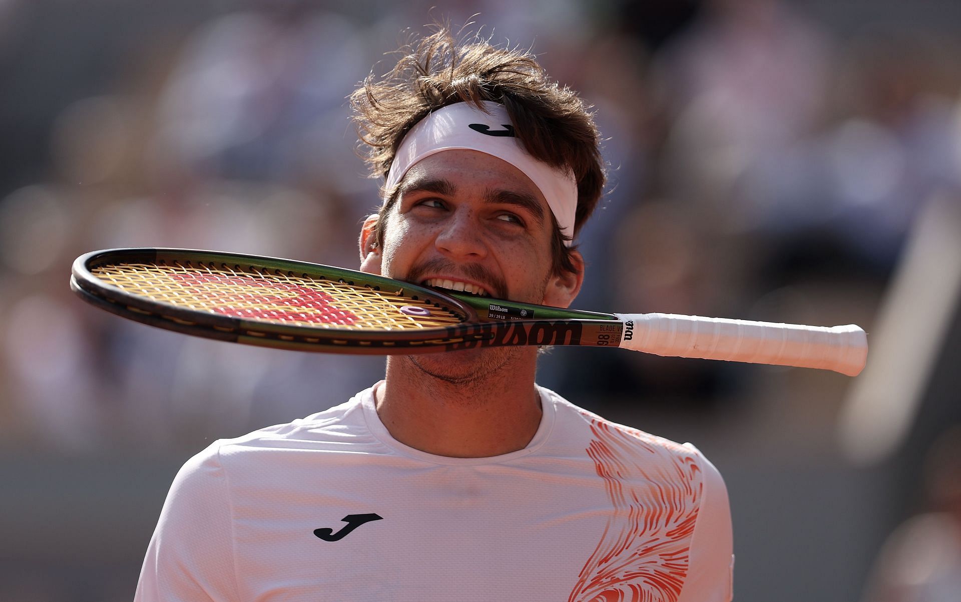 Thiago Seyboth Wild reacts after beating Daniil Medvedev at the French Open 2023