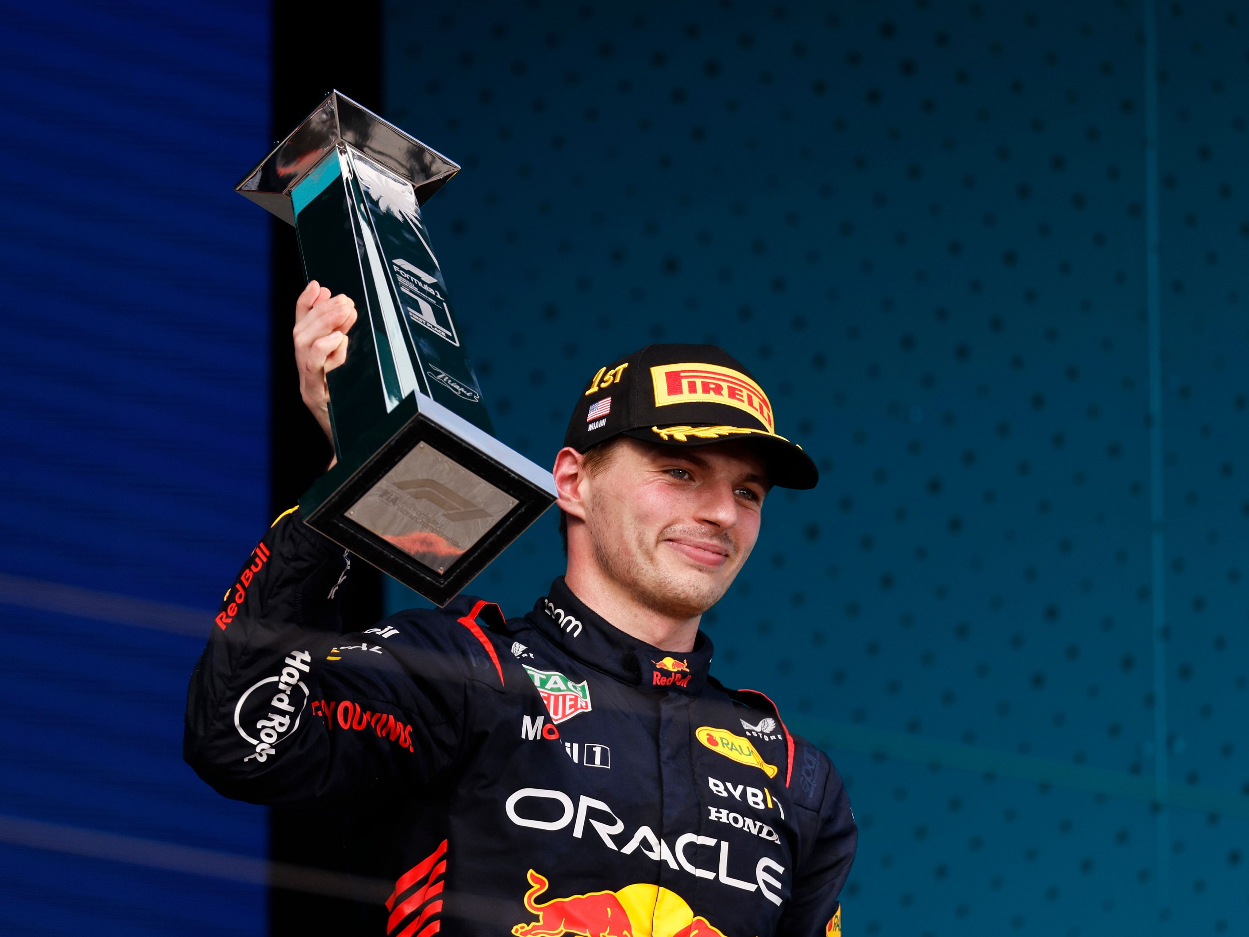 Race winner Max Verstappen celebrates on the podium during the 2023 F1 Miami Grand Prix. (Photo by Chris Graythen/Getty Images)