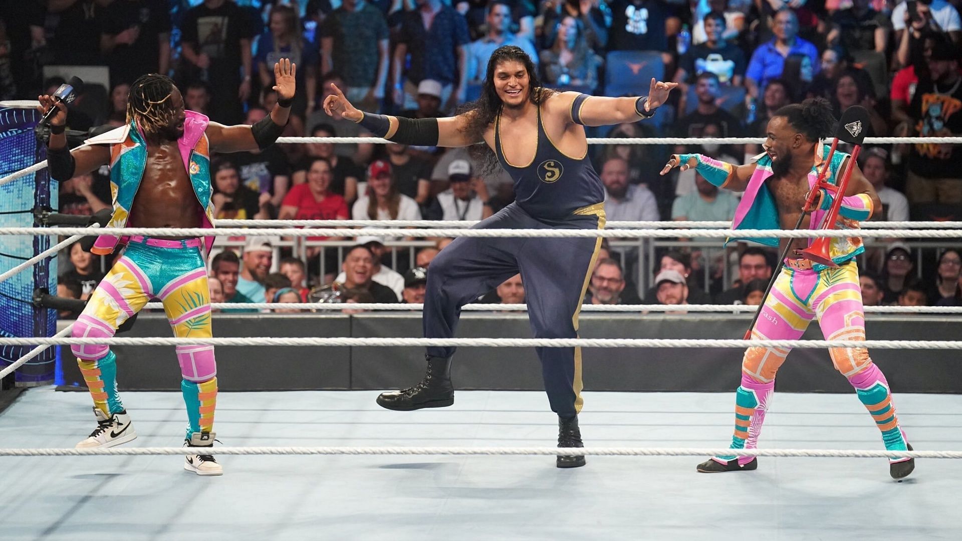 Shanky dances with the New Day on WWE SmackDown.