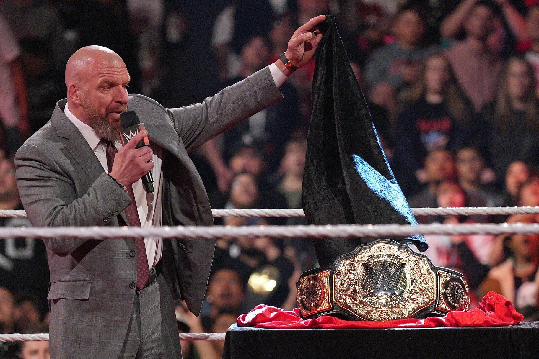 Triple H unveils the new World Heavyweight Championship.