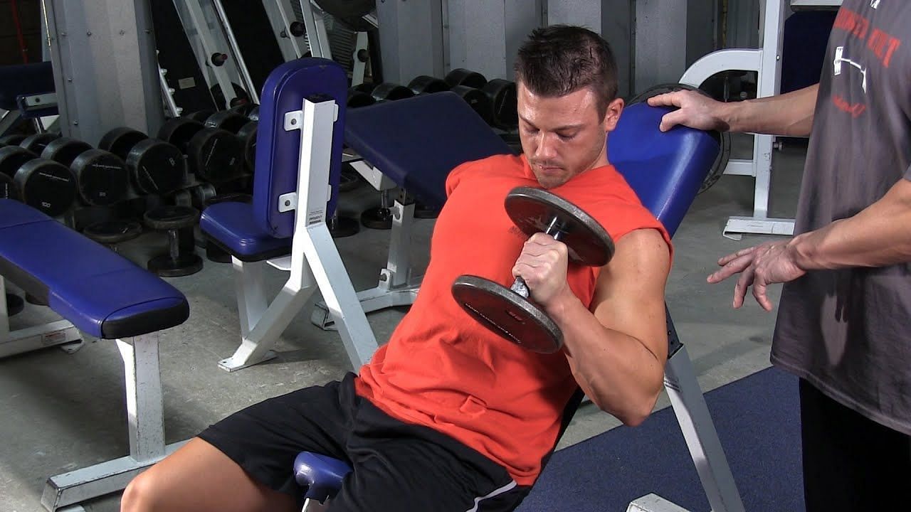This exercise is a variation of the traditional bicep curl. (Image via Youtube/Broser Built)