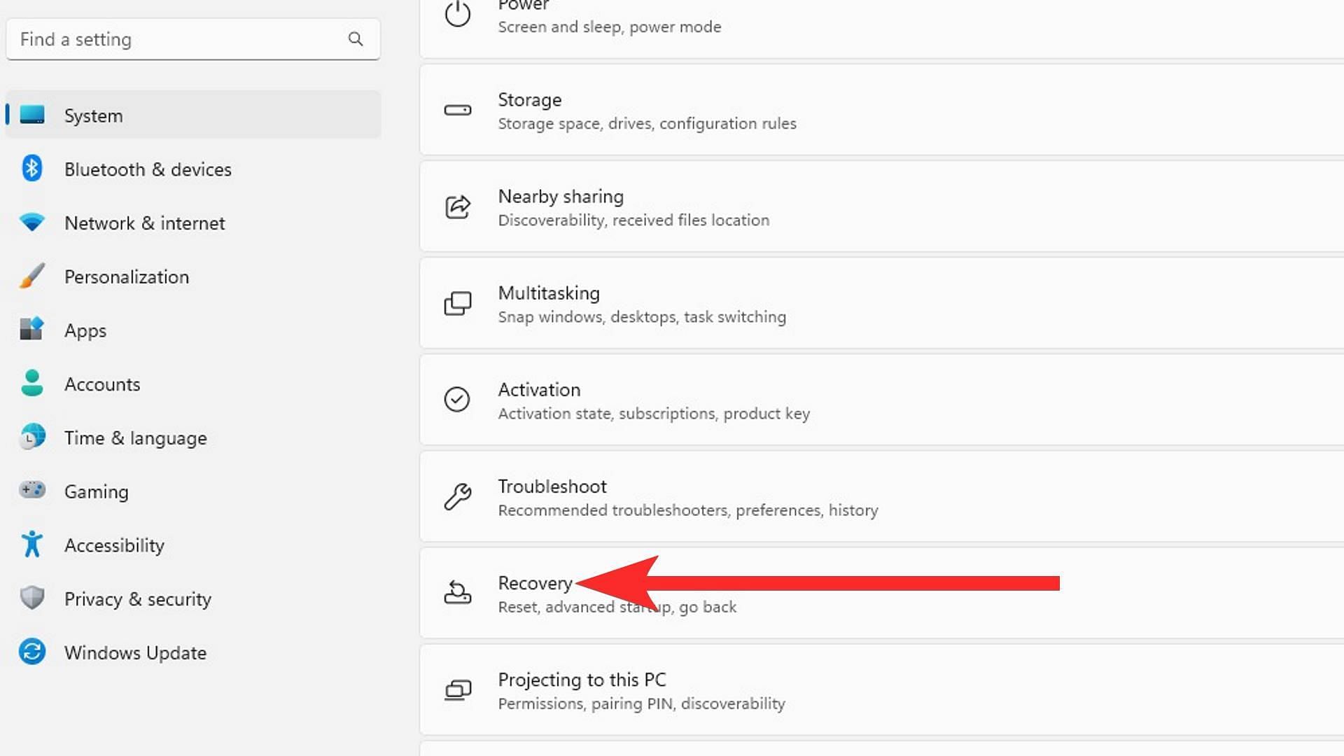 Click on &quot;Recovery&quot; in the System Settings. (Image via Sportskeeda)