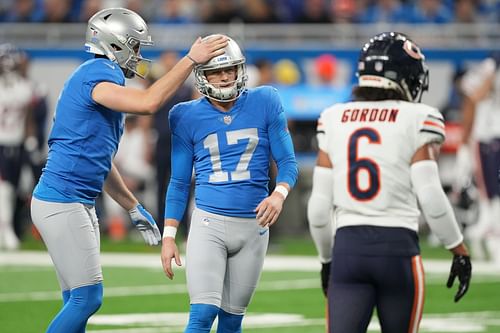 Jack Fox (center) at Chicago Bears v Detroit Lions