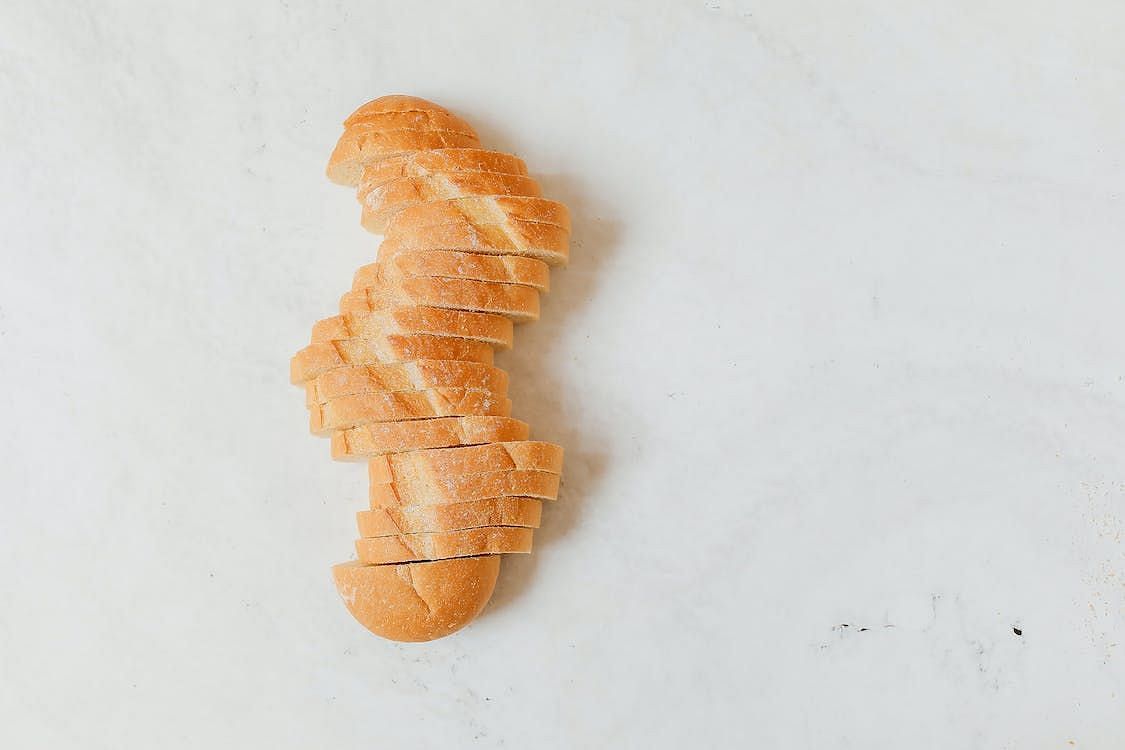 Refined bread is crafted from refined flour, which undergoes a meticulous process that involves the removal of the bran and germ components, consequently depleting it of vital nutrients. (Polina Tankilevitch/ Pexels)