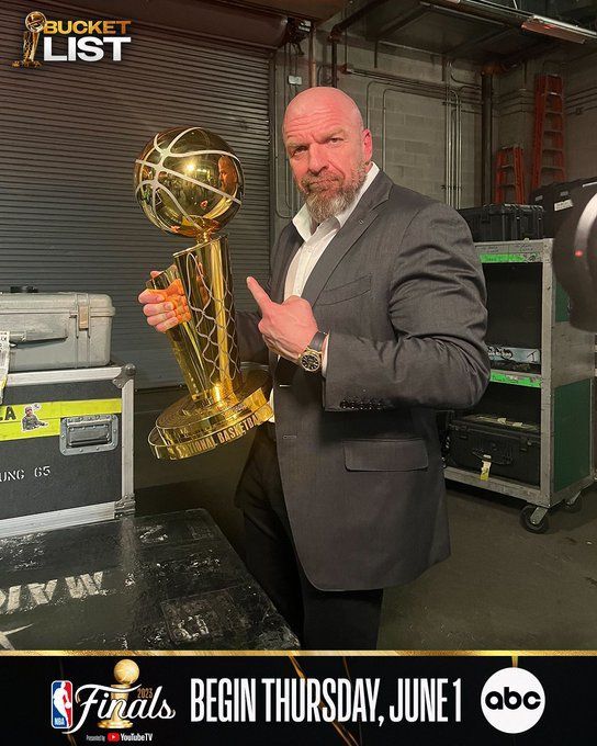 The Larry O'Brien NBA championship trophy makes a surprise appearance at  WWE Raw