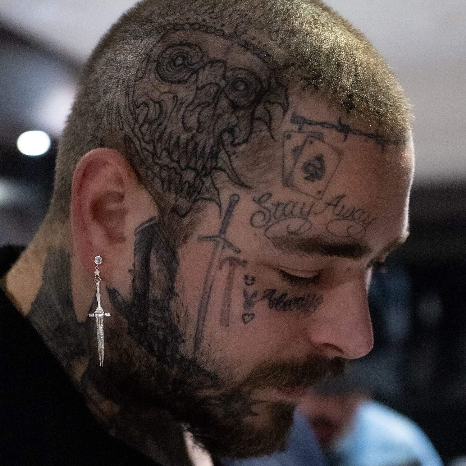 Post Malone tattoos daughters initials on his face