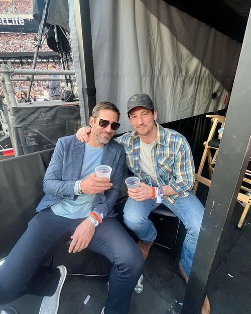 Aaron Rodgers with Miles Teller during Taylor Swift's concert at MetLife Stadium (image via IG/@aaronrodgers12)