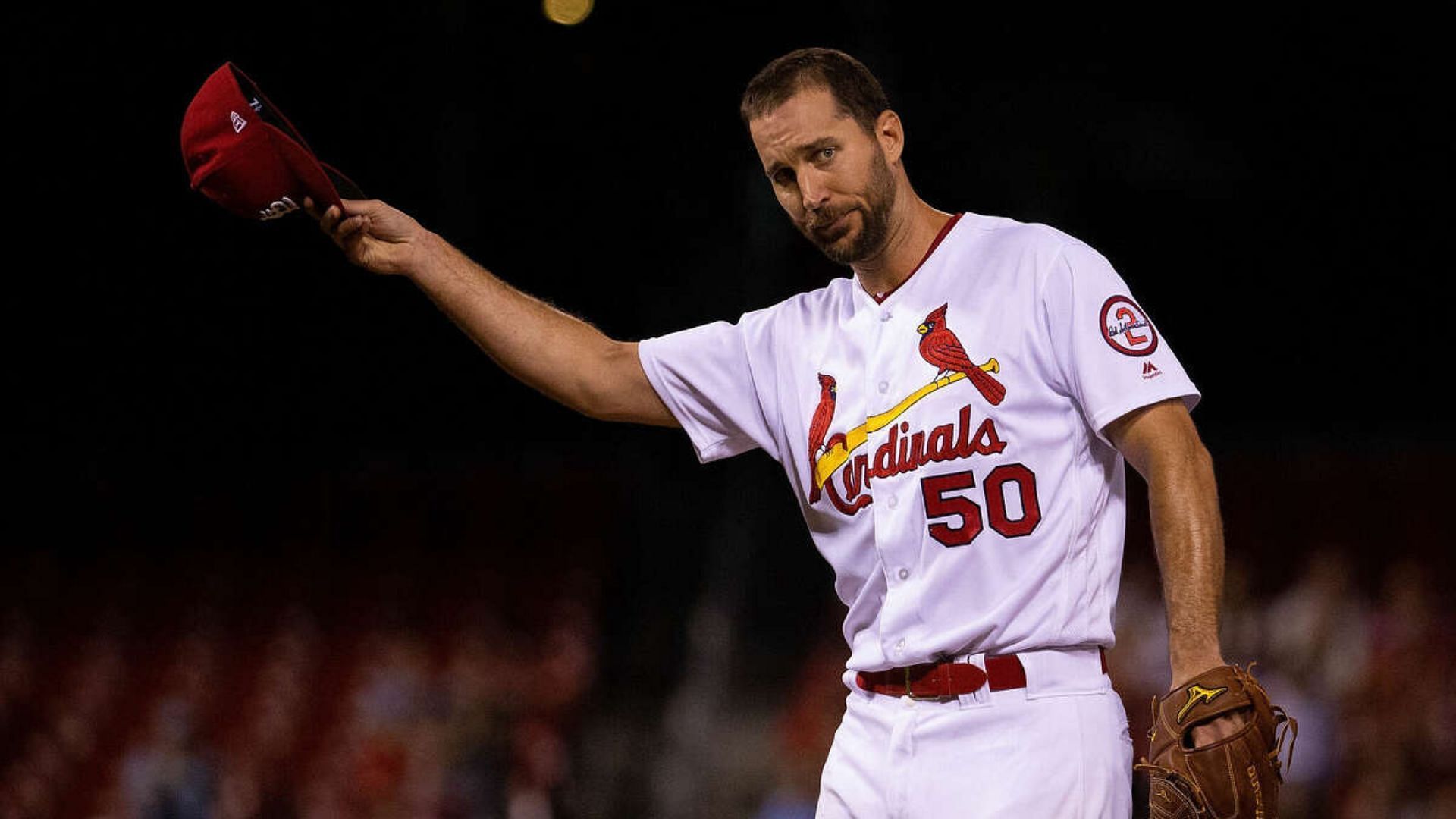 Adam Wainwright wearing a Cardinal jersey