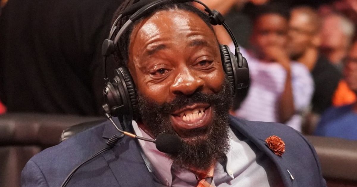 Booker T was caught on his phone 