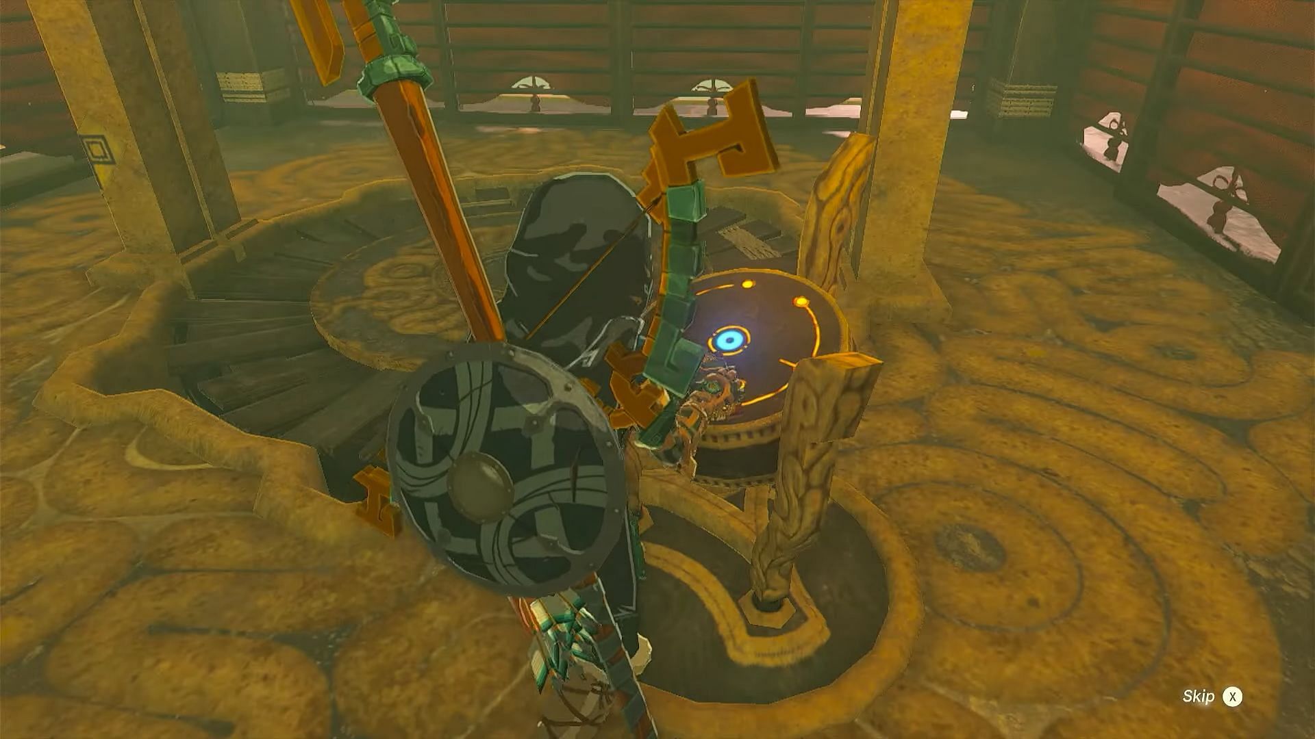 Link places the Purah Pad in the terminal to gain access to the map (Image via Nintendo)