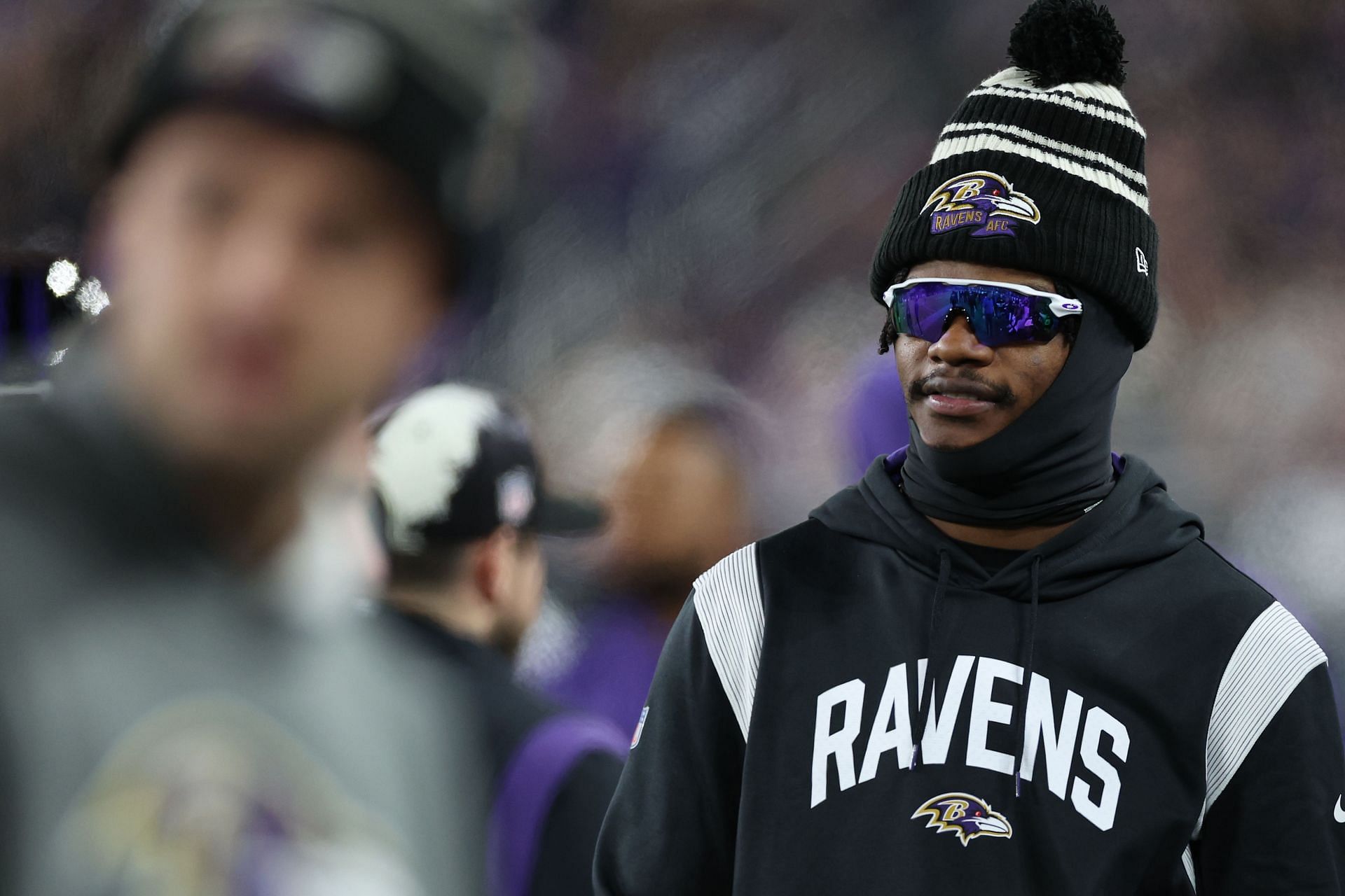 Baltimore Ravens QB Lamar Jackson watches on from the sidelines