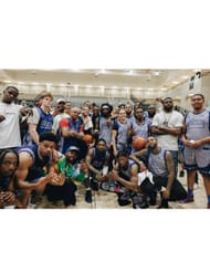 Participants pose for a photo after the game.