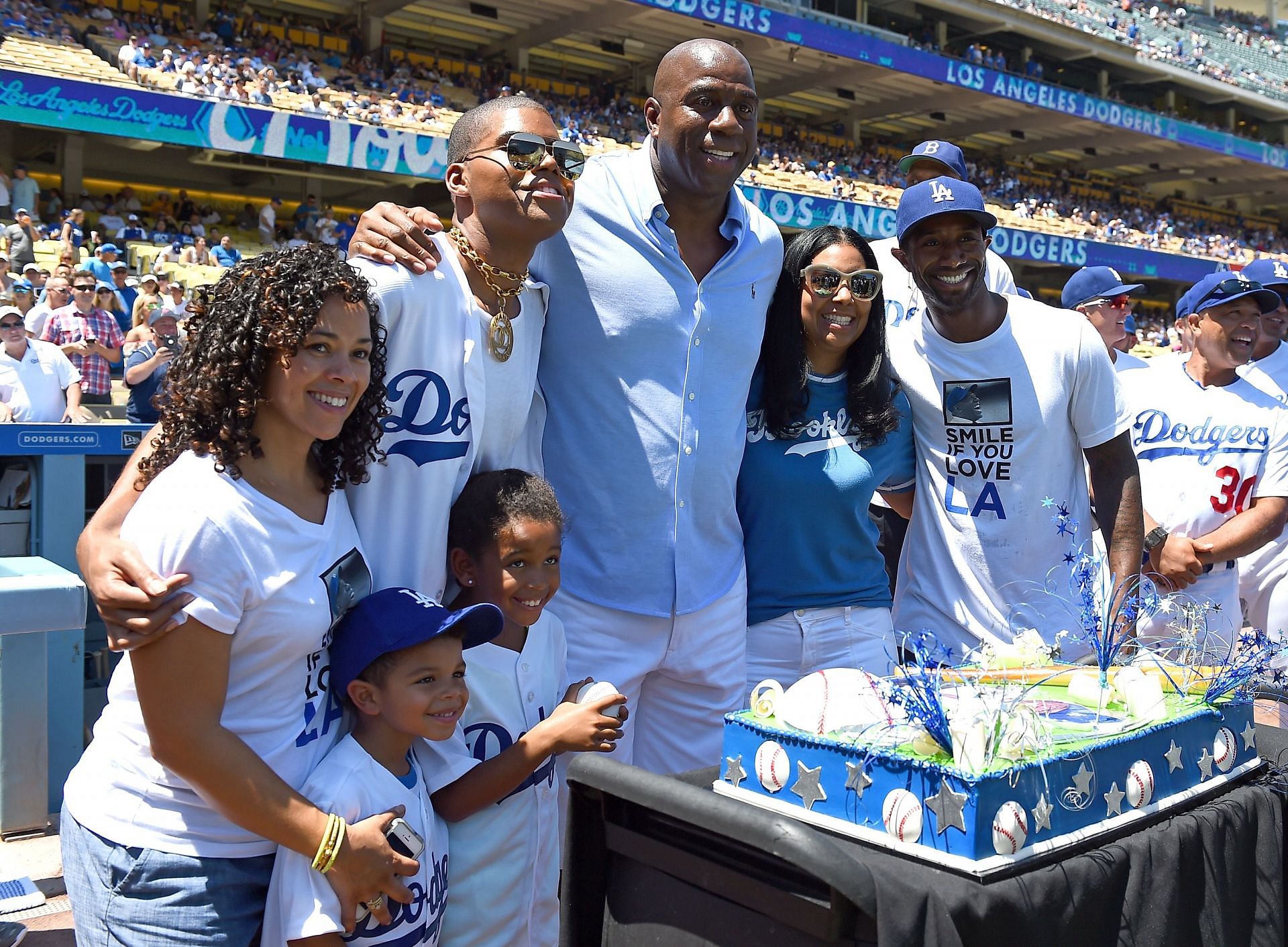 Magic Johnson with his family before an LA Dodgers game.
