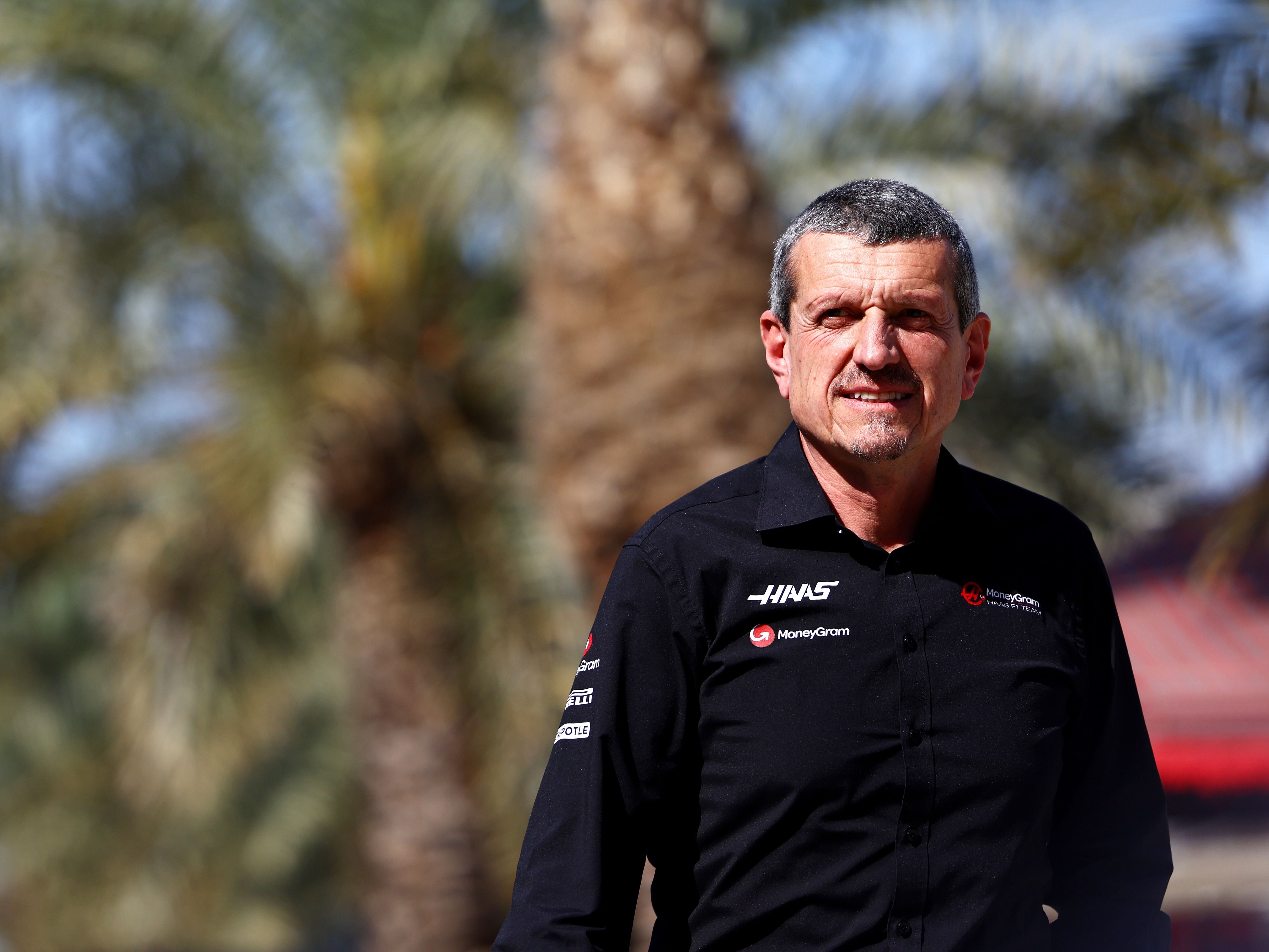 Guenther Steiner walks in the paddock during previews ahead of the 2023 F1 Bahrain Grand Prix (Photo by Mark Thompson/Getty Images)