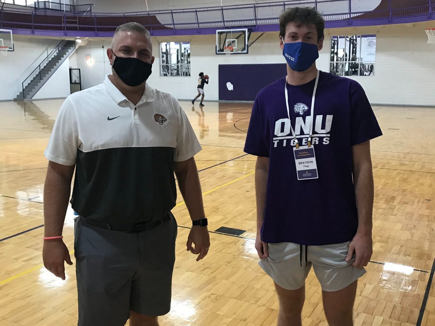 Olivet Nazarene coach Nick Birkey and Braydon Flagg (Photo: Braydon Flagg/Twitter)