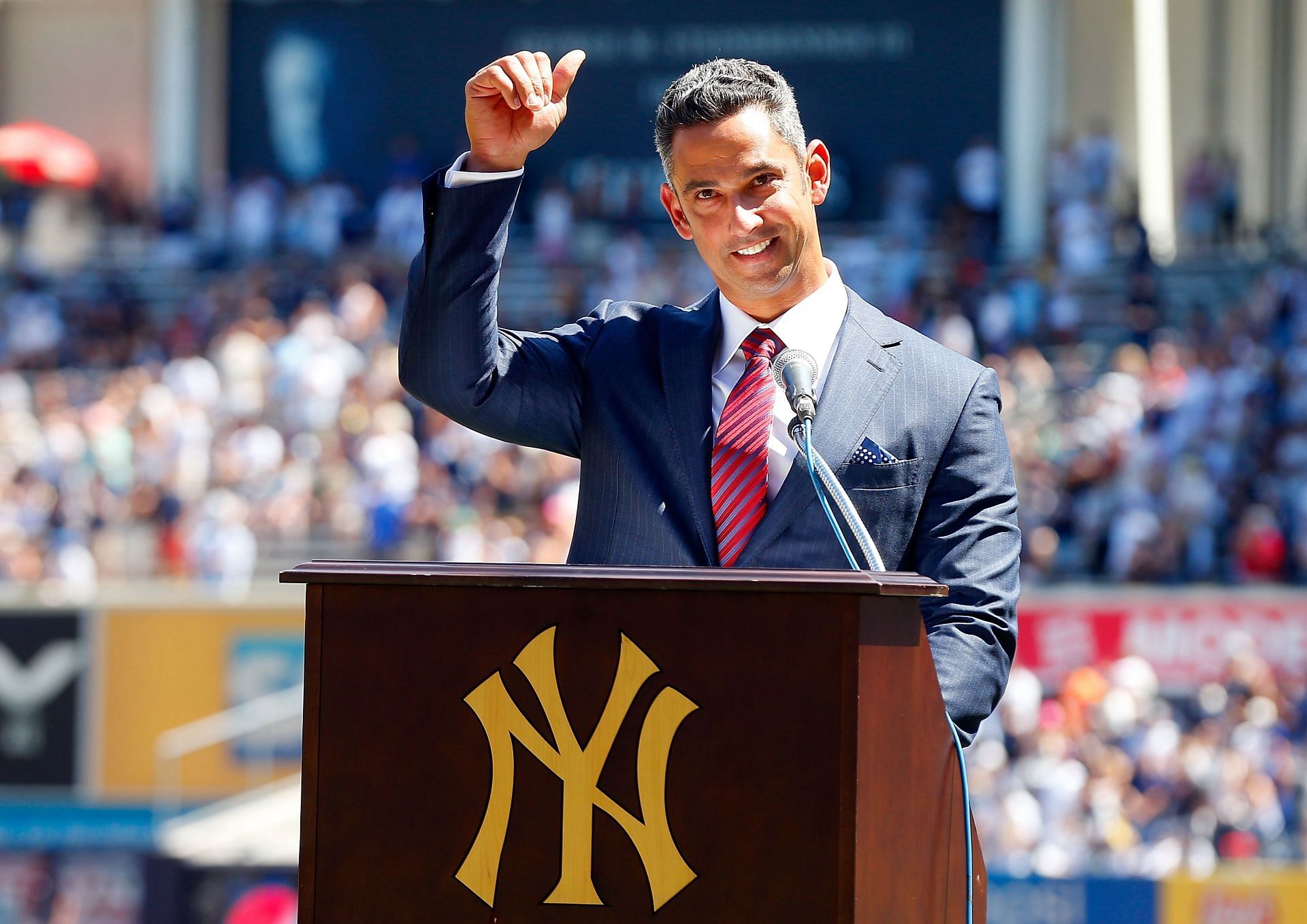 Cleveland Indians v New York Yankees: NEW YORK, NY - AUGUST 22: Former New York Yankee Jorge Posada speaks to the crowd during a ceremony retiring his number before the Yankees play against the Cleveland Indians at Yankee Stadium on August 22, 2015 in the Bronx borough of New York City. (Photo by Jim McIsaac/Getty Images)