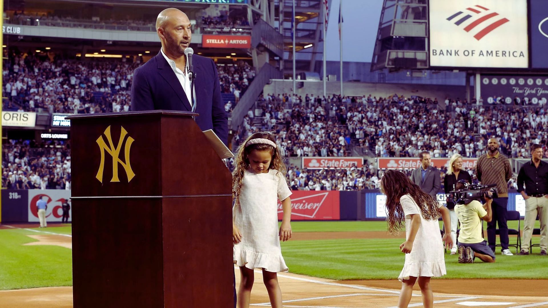 Derek Jeter with his daughters at Yankee Stadium.