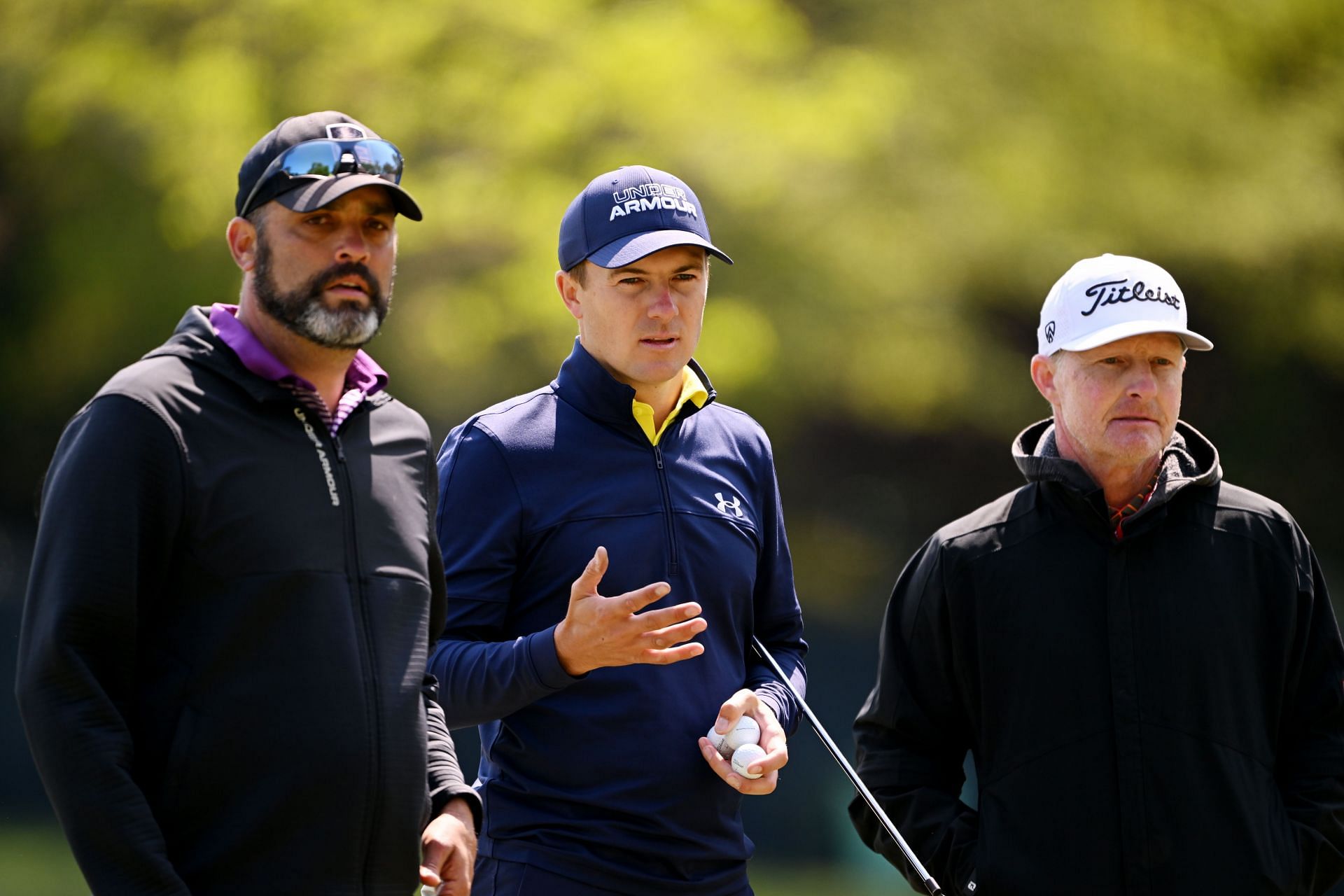 Caddie Michael Greller, Jordan Spieth, and coach Cameron McCormick during the practice round ahead of the 2023 PGA Championship