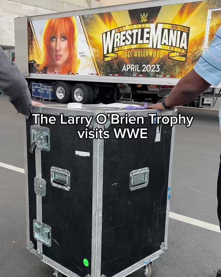 The Larry O'Brien NBA championship trophy makes a surprise appearance at  WWE Raw