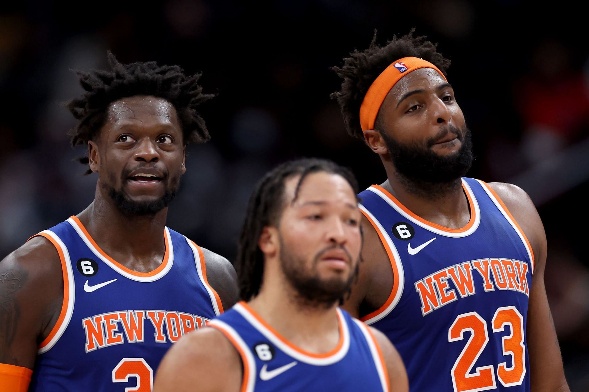 Julius Randle, Jalen Brunson and Mitchell Robinson of the New York Knicks