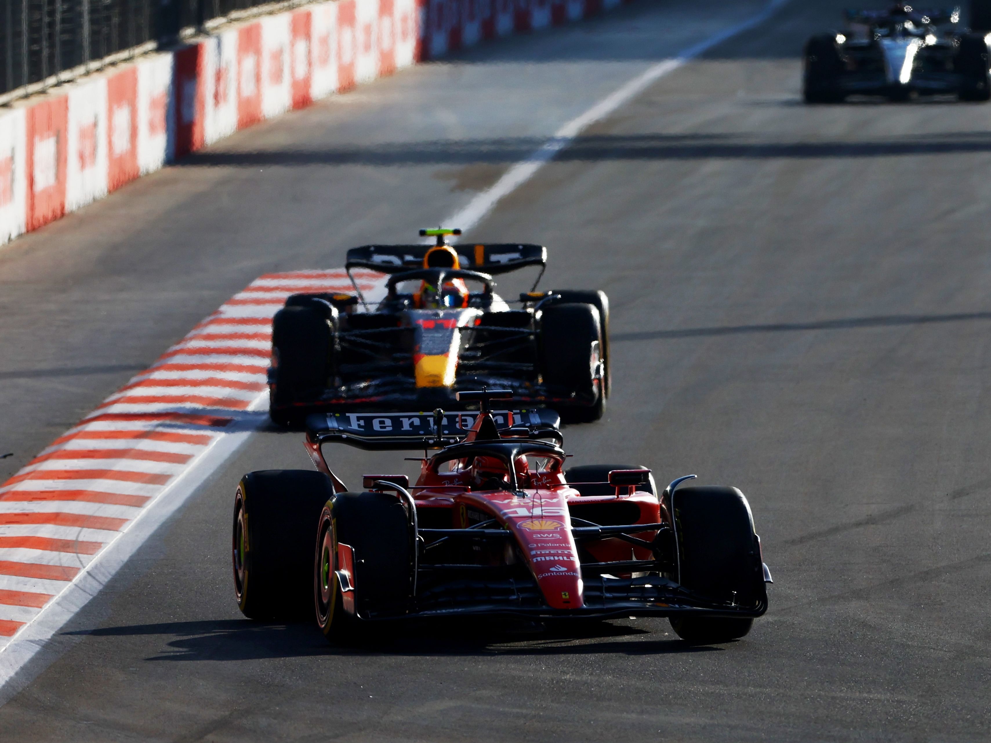 Charles Leclerc (16) leads Sergio Perez (11) during the Sprint ahead of the 2023 F1 Azerbaijan Grand Prix. (Photo by Mark Thompson/Getty Images)
