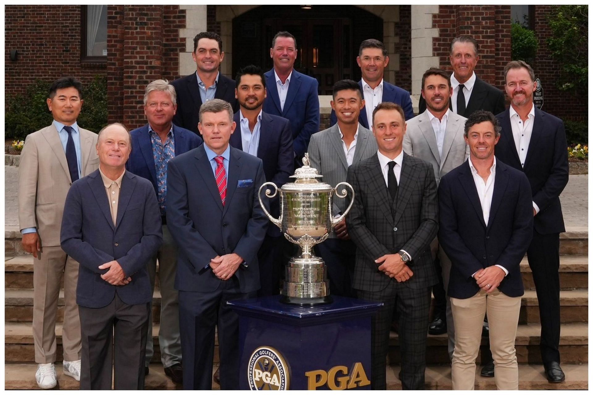 14 former champions pose with the trophy at the 2023 PGA Championship Champions Dinner